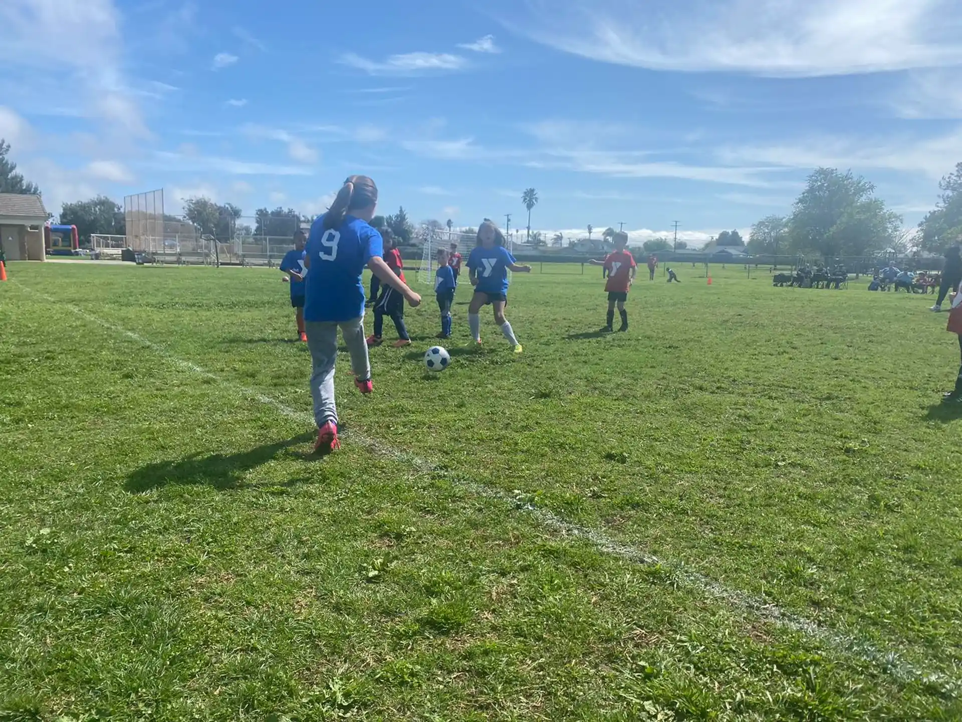 a group of people playing football
