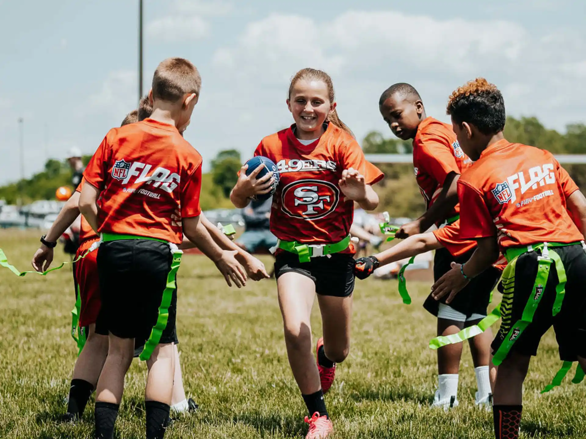 a group of people in sports uniforms