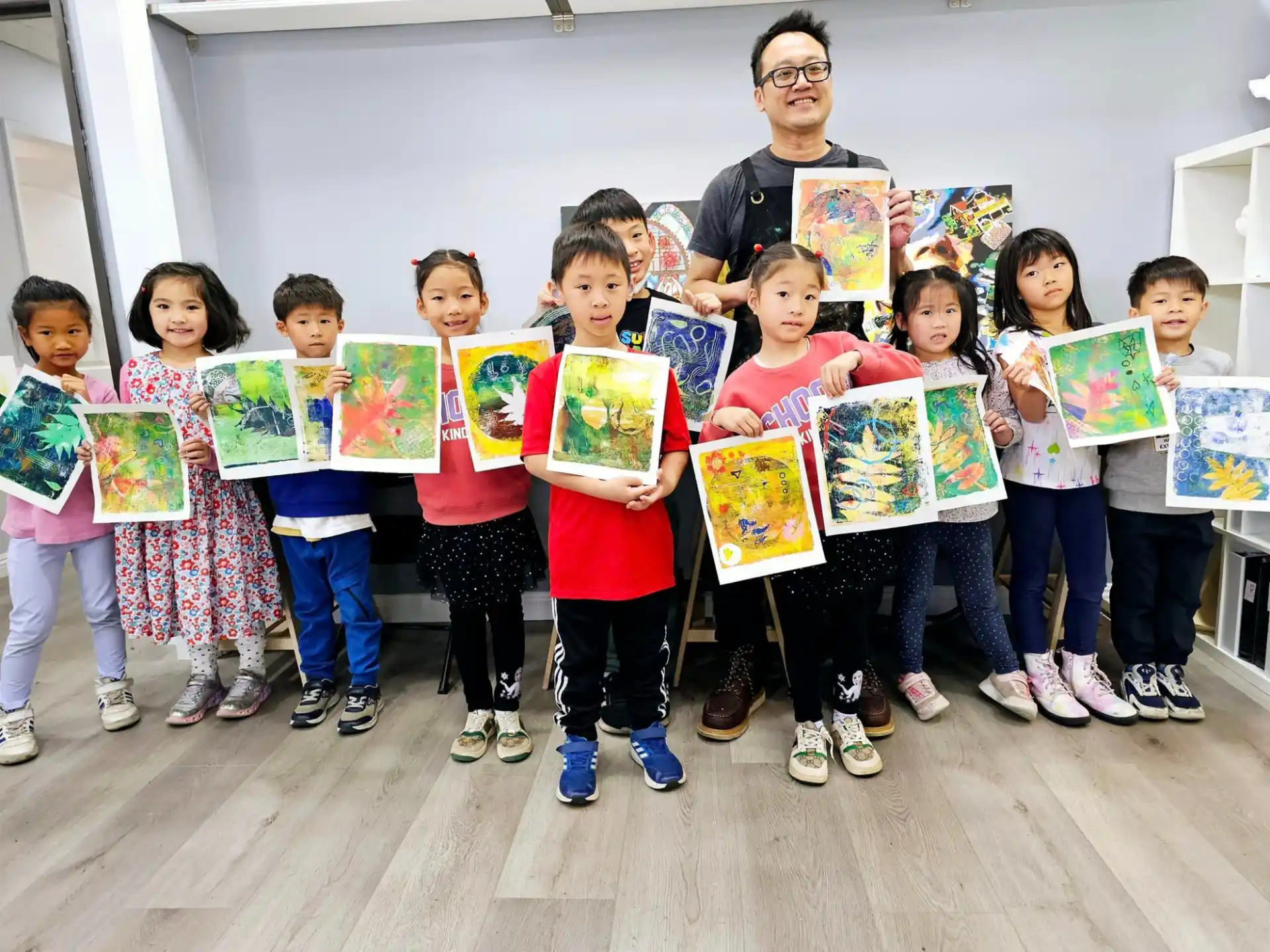 a group of children holding books