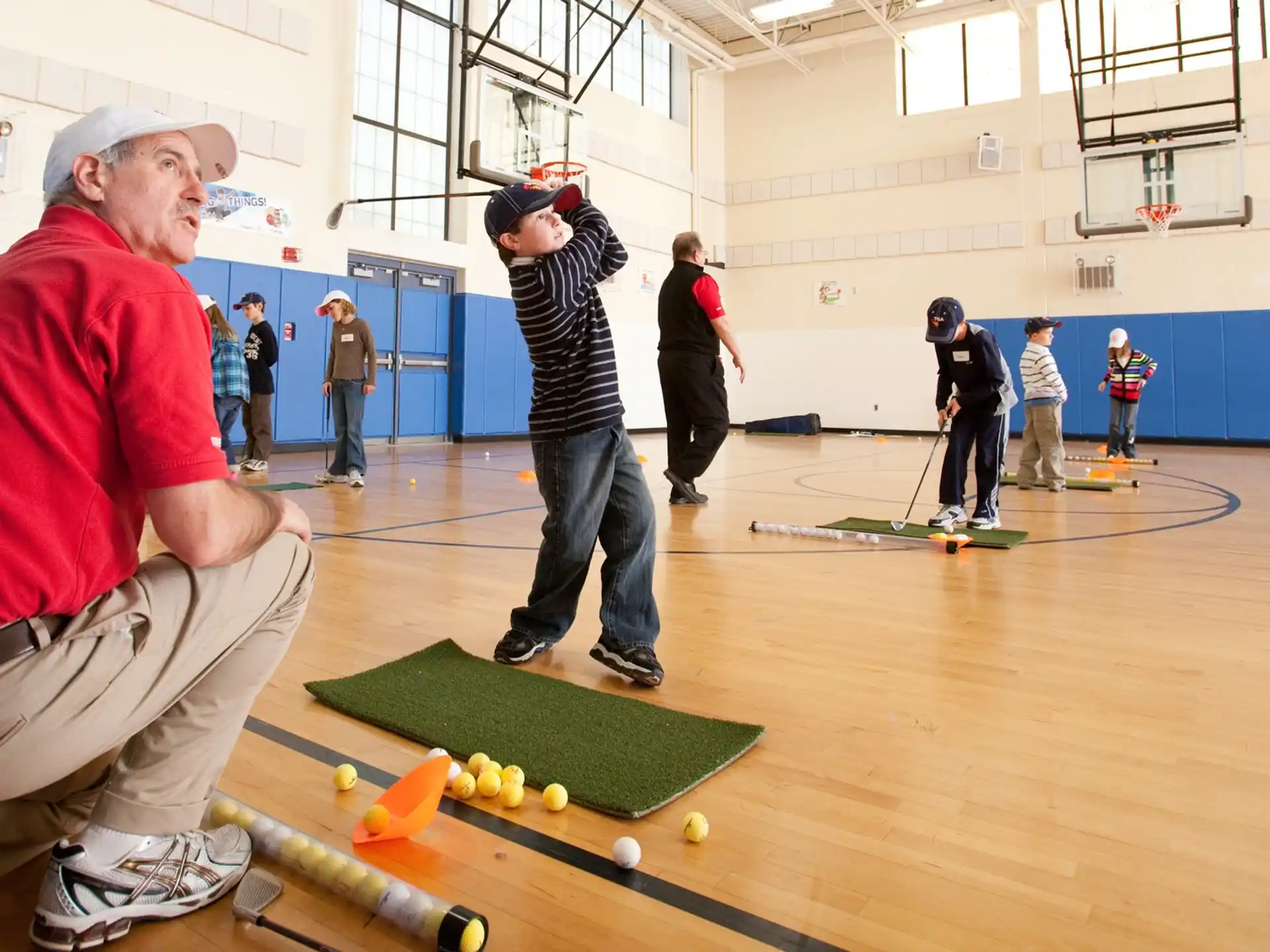 a group of people playing pool