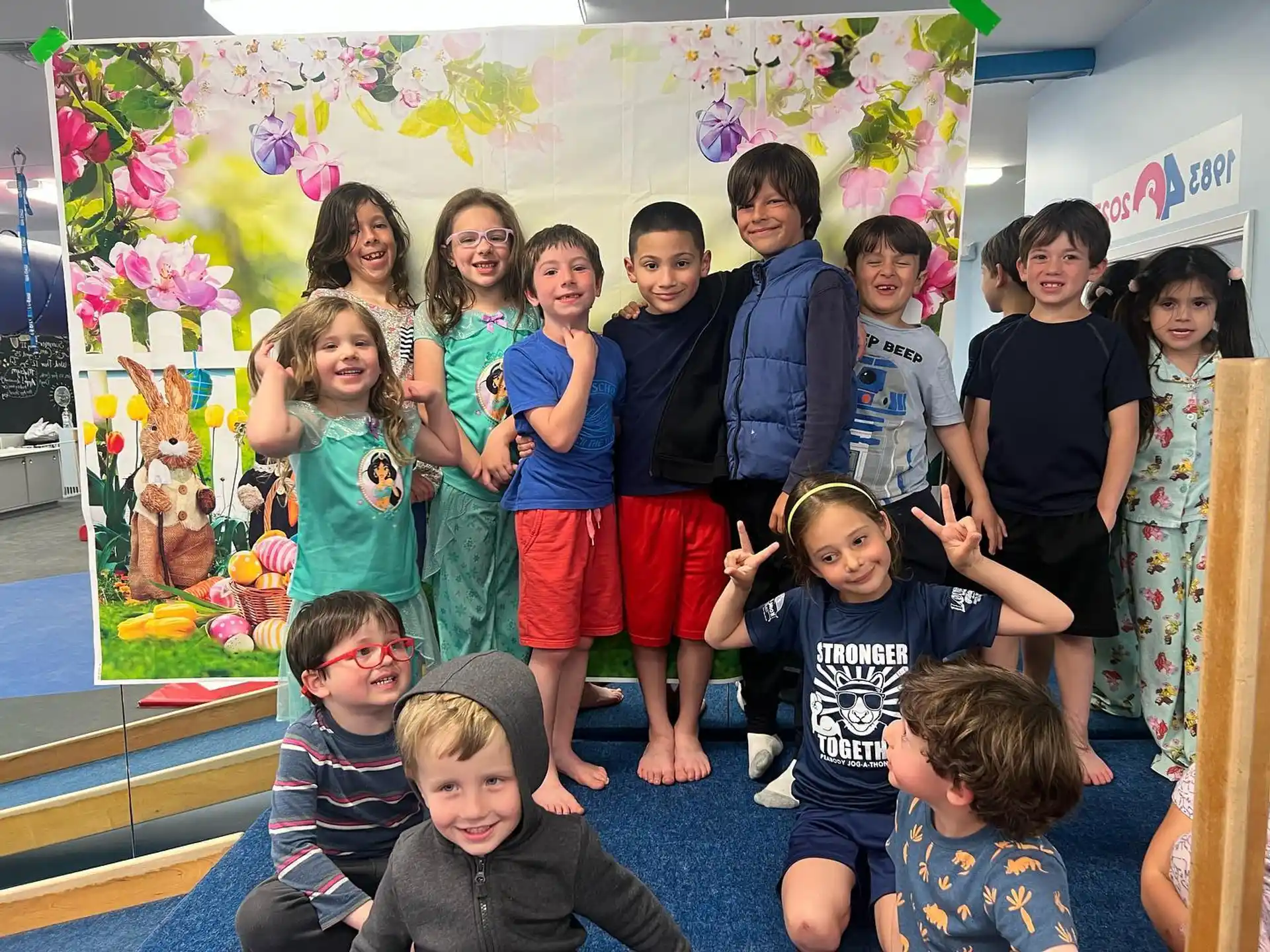 a group of children posing for a photo