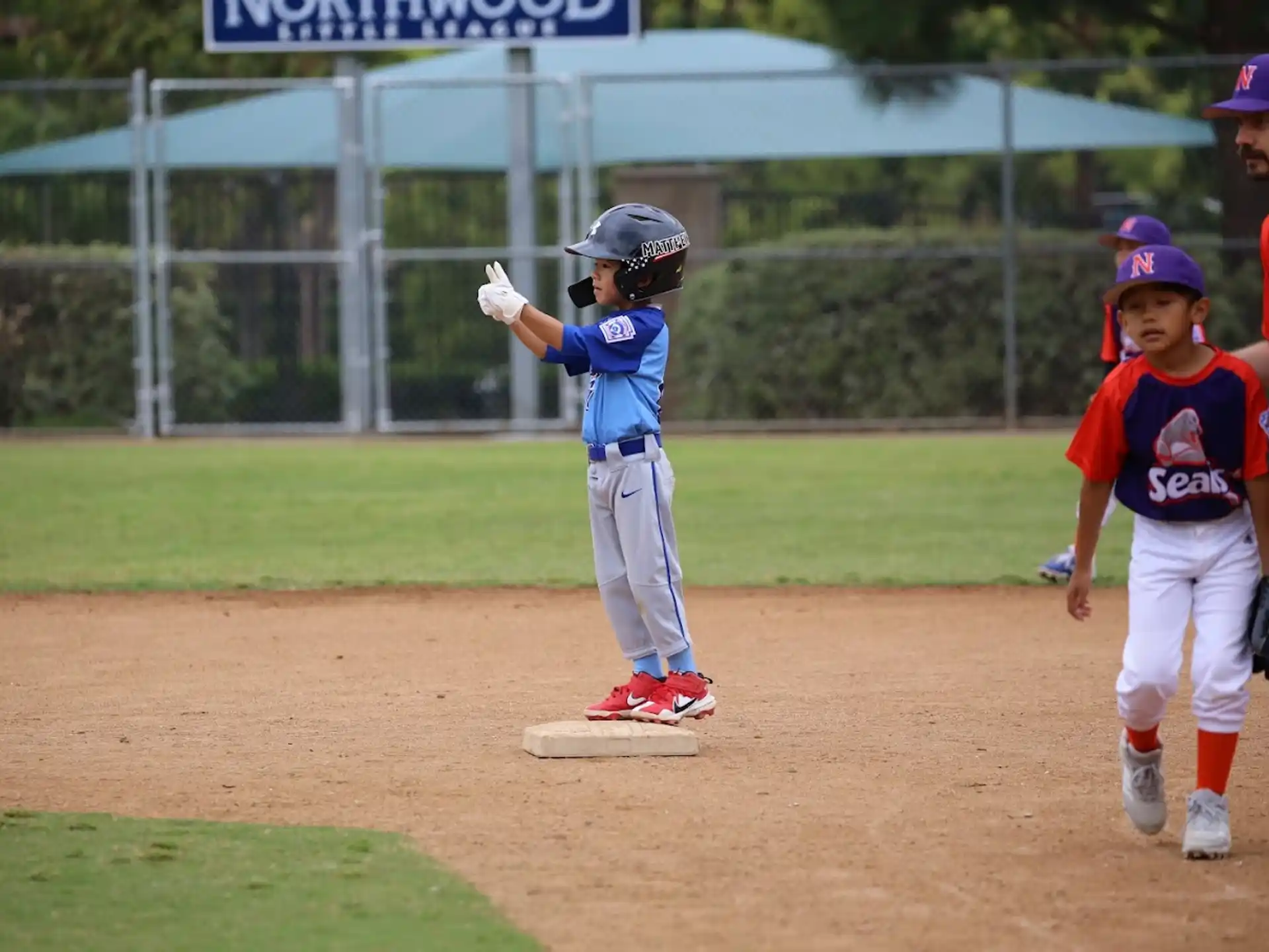 a kid in a blue shirt
