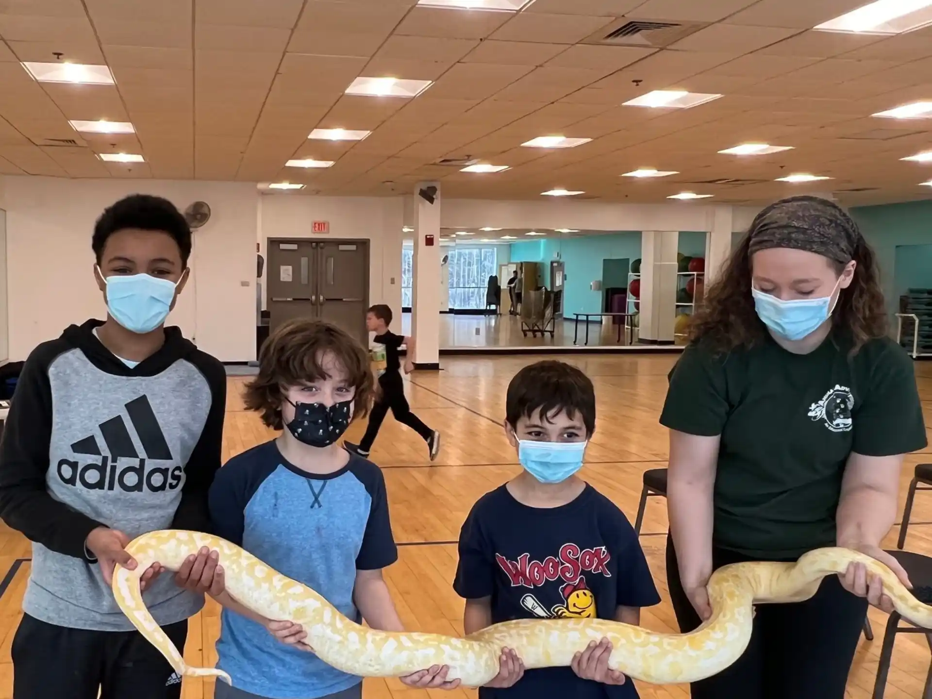 a group of people wearing masks
