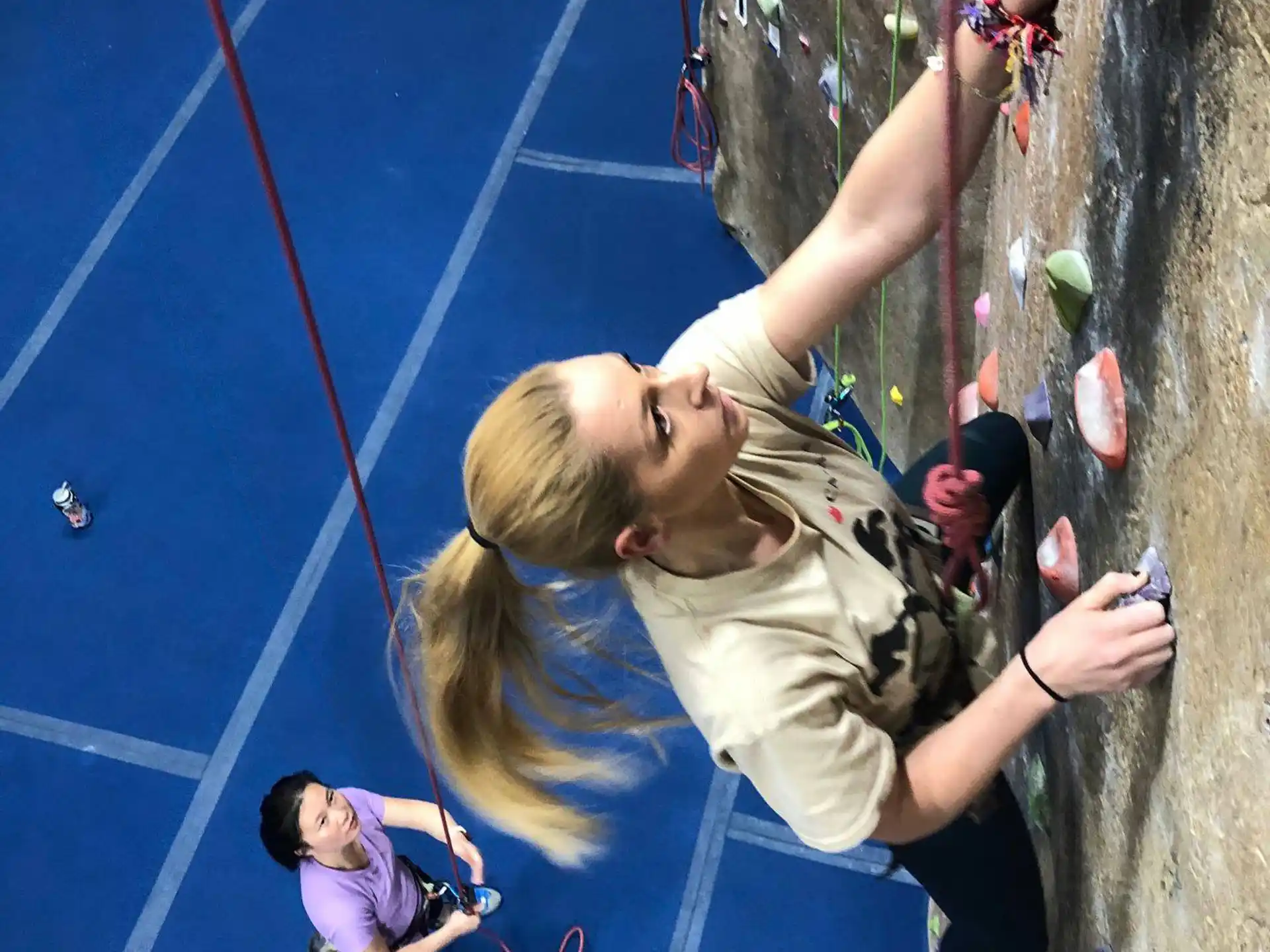 a person climbing a rock wall