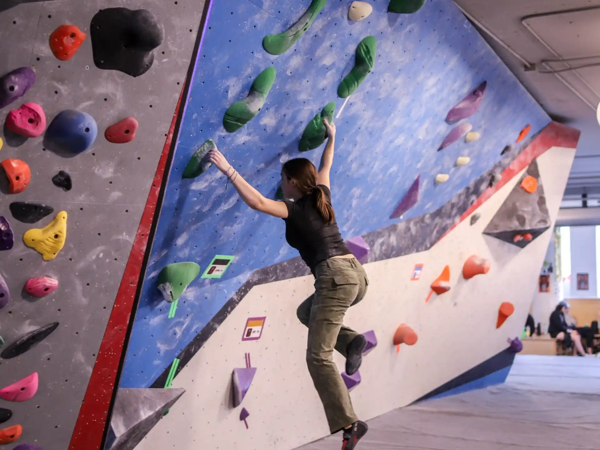 a person climbing a rock wall