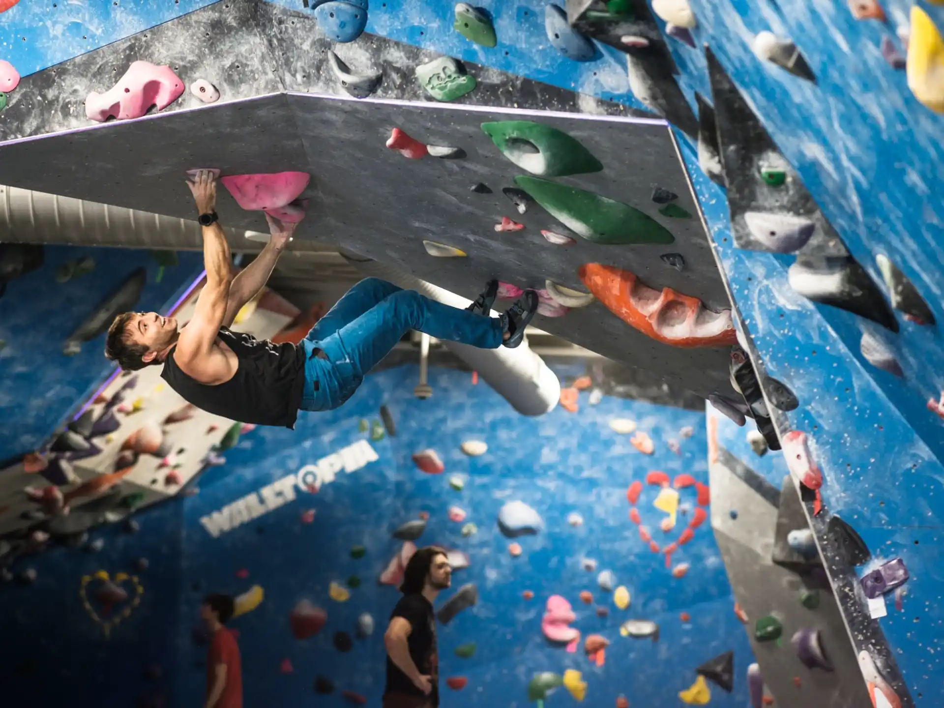 a person climbing a rock wall