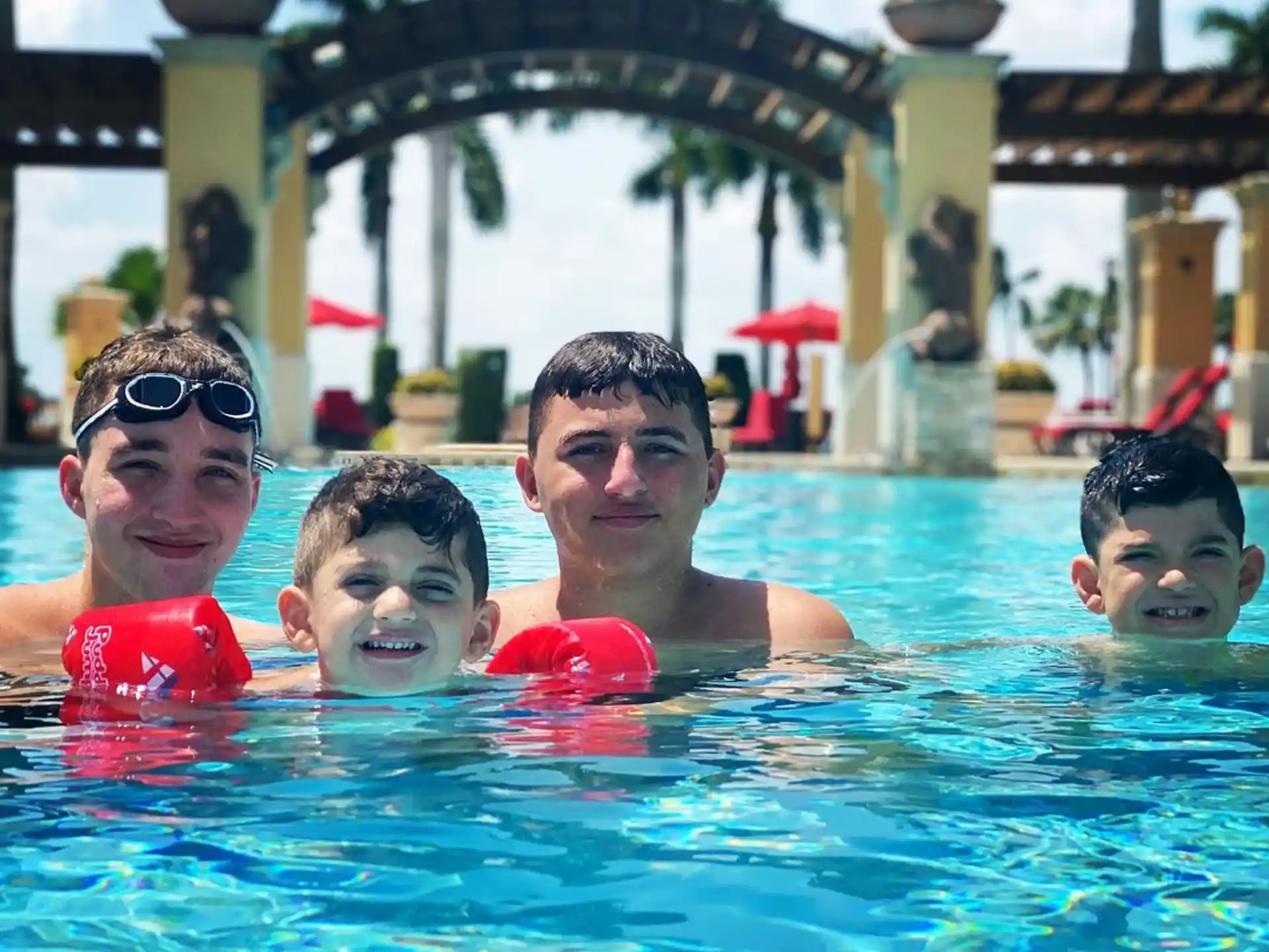 a group of people in a pool