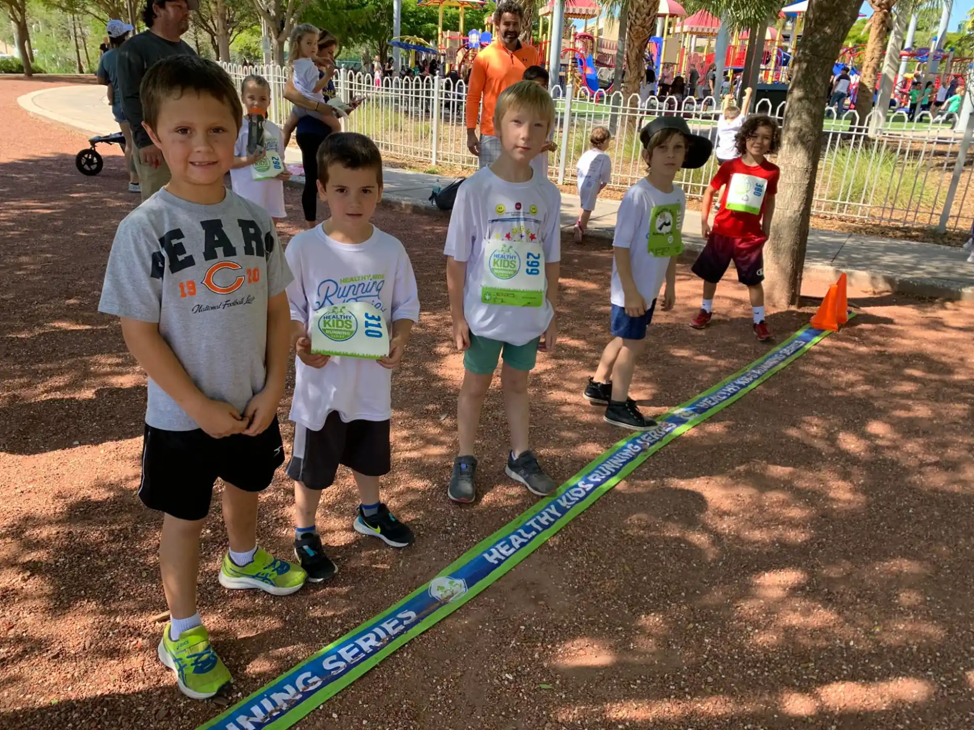 a group of kids playing on a playground