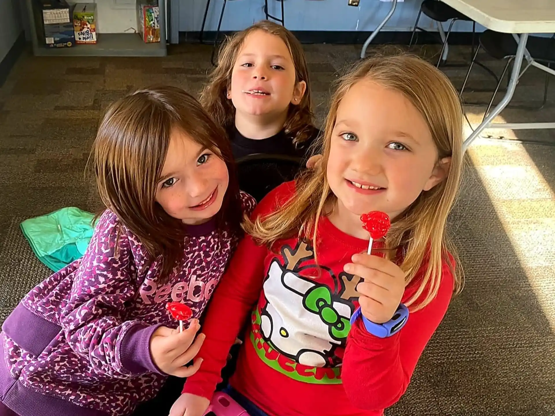 a group of girls posing for a picture