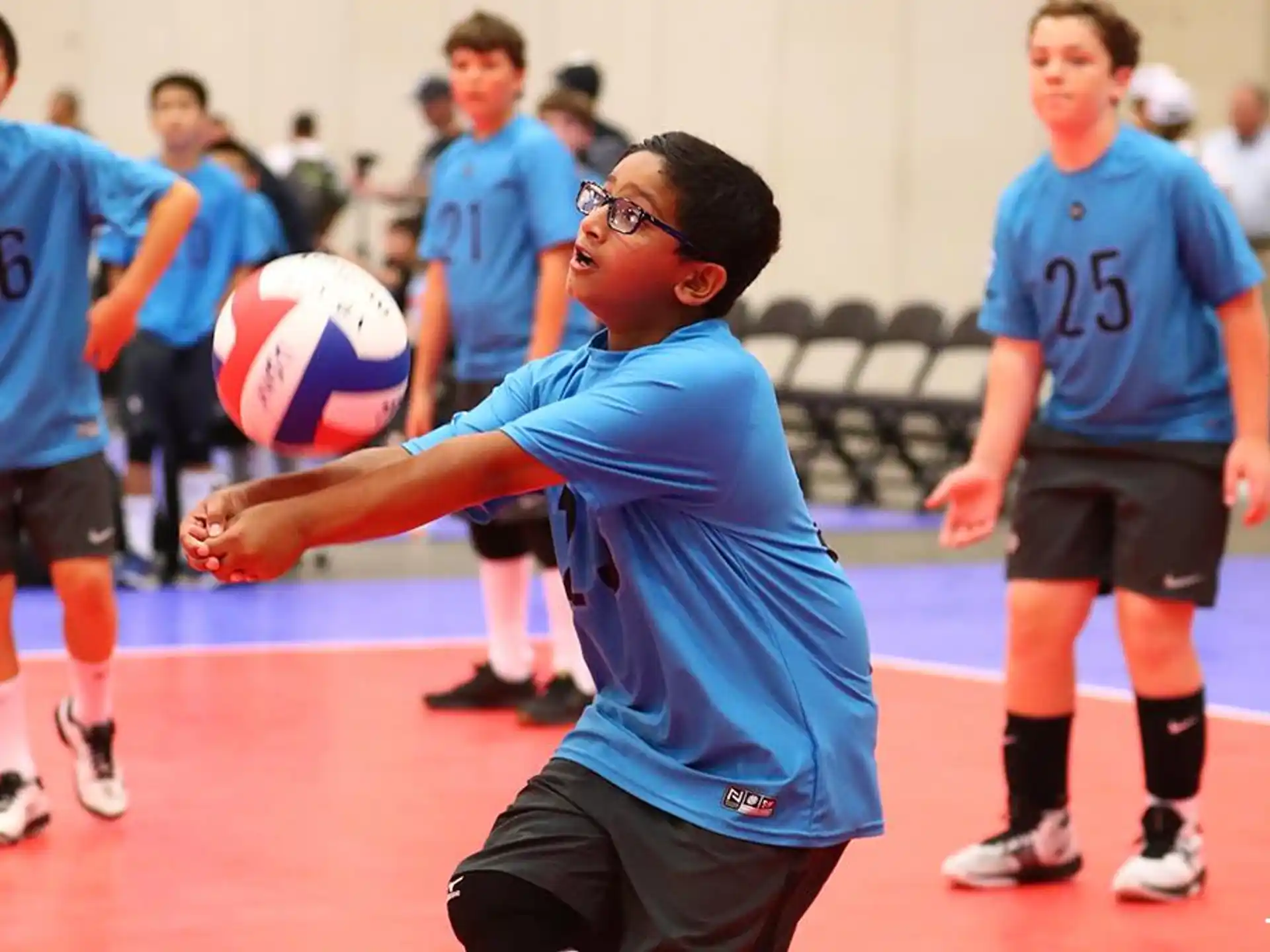 a man playing volleyball