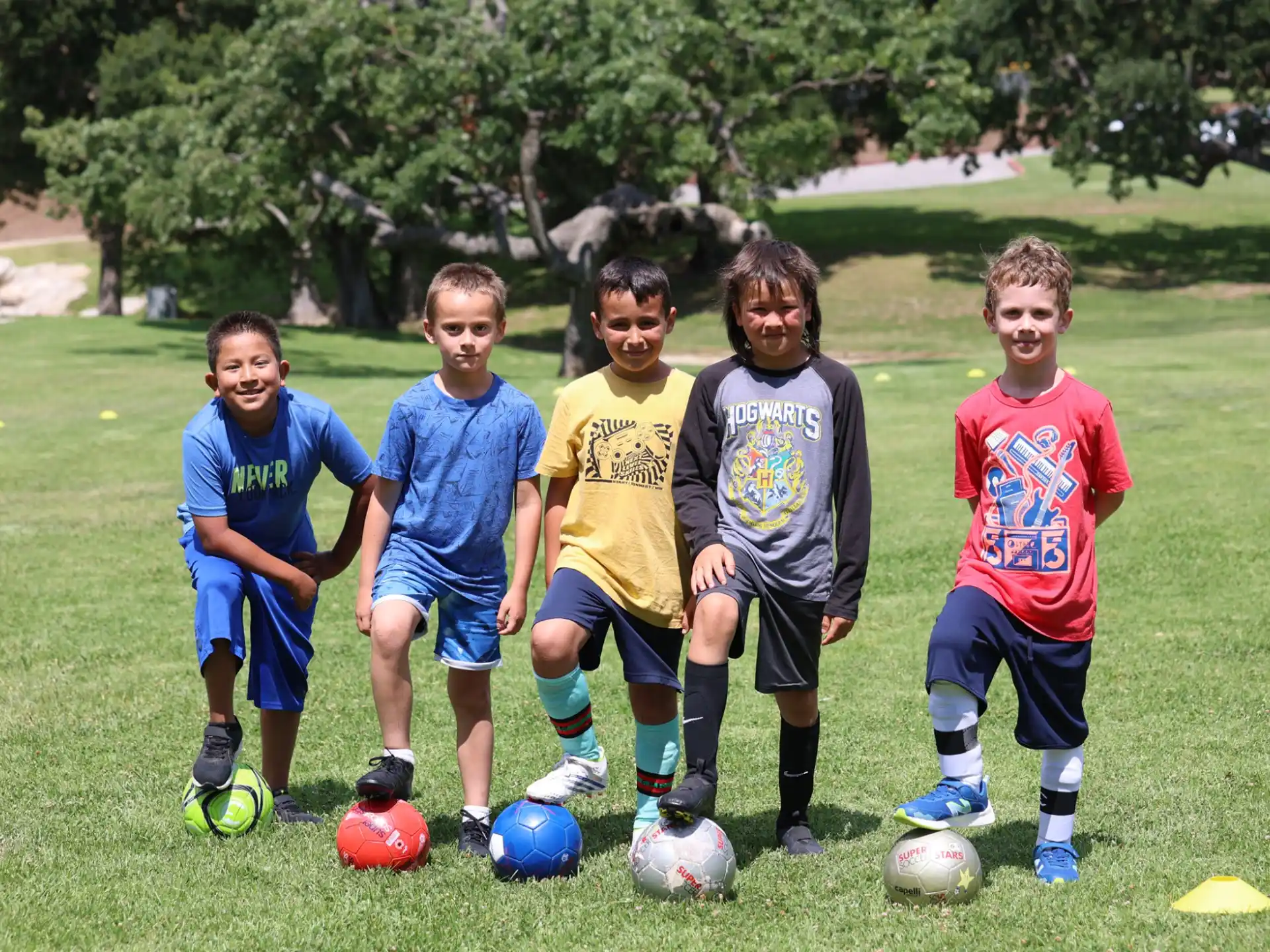 a group of boys playing football