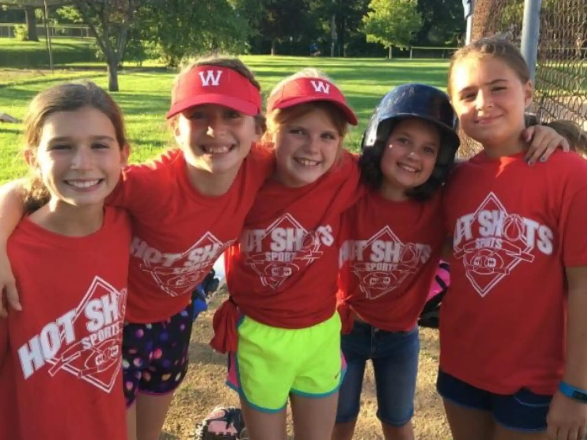 a group of girls posing for a photo