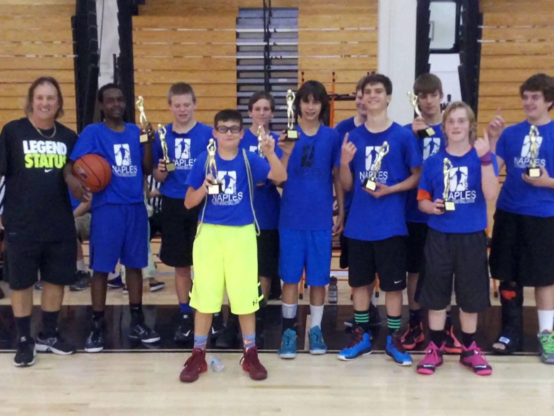 a group of boys in a gym