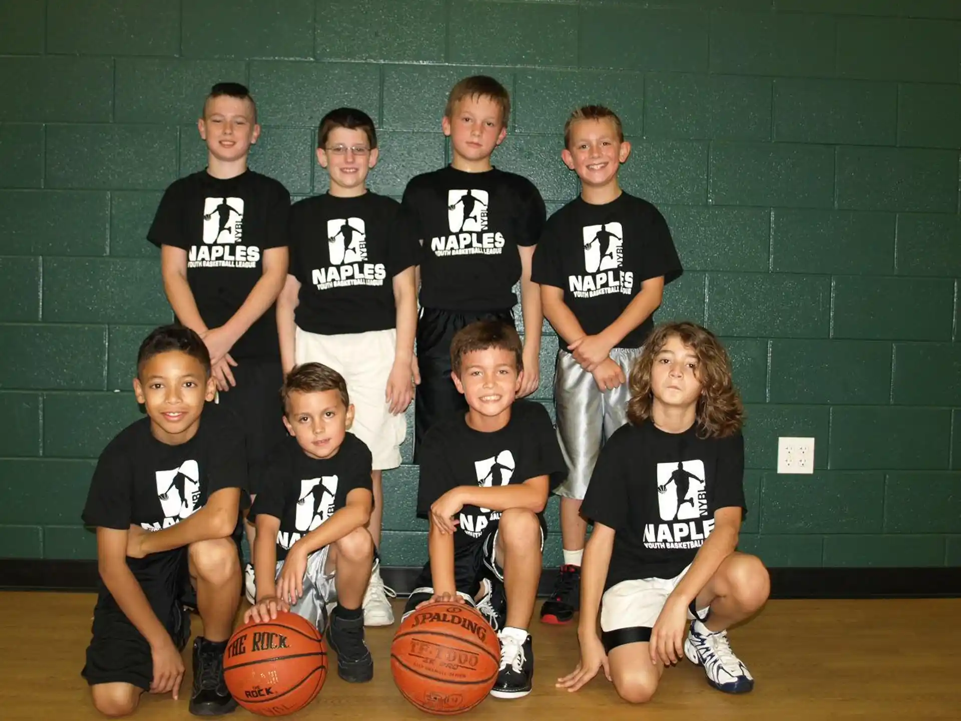 a group of kids posing for a photo