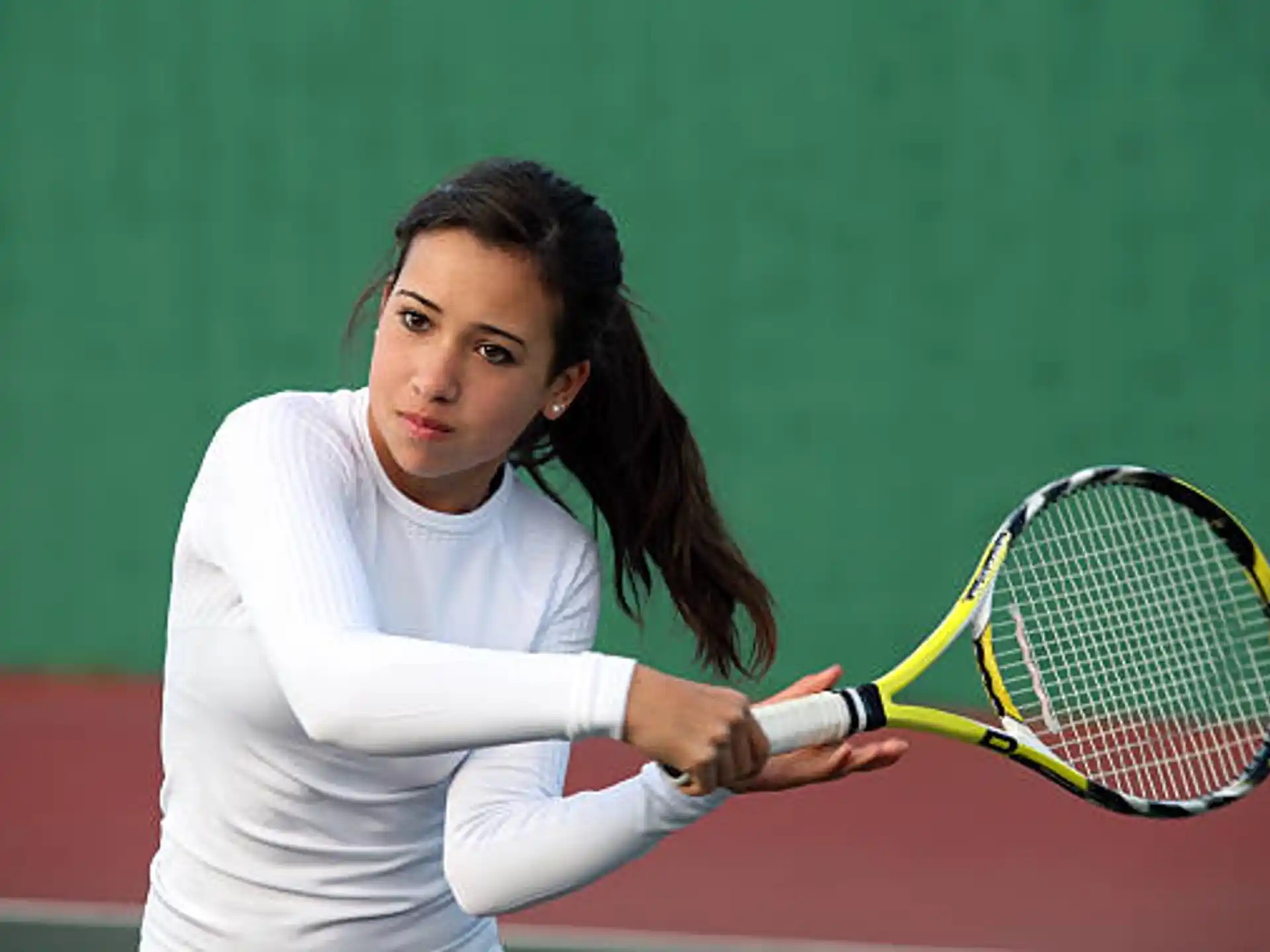 a woman playing tennis