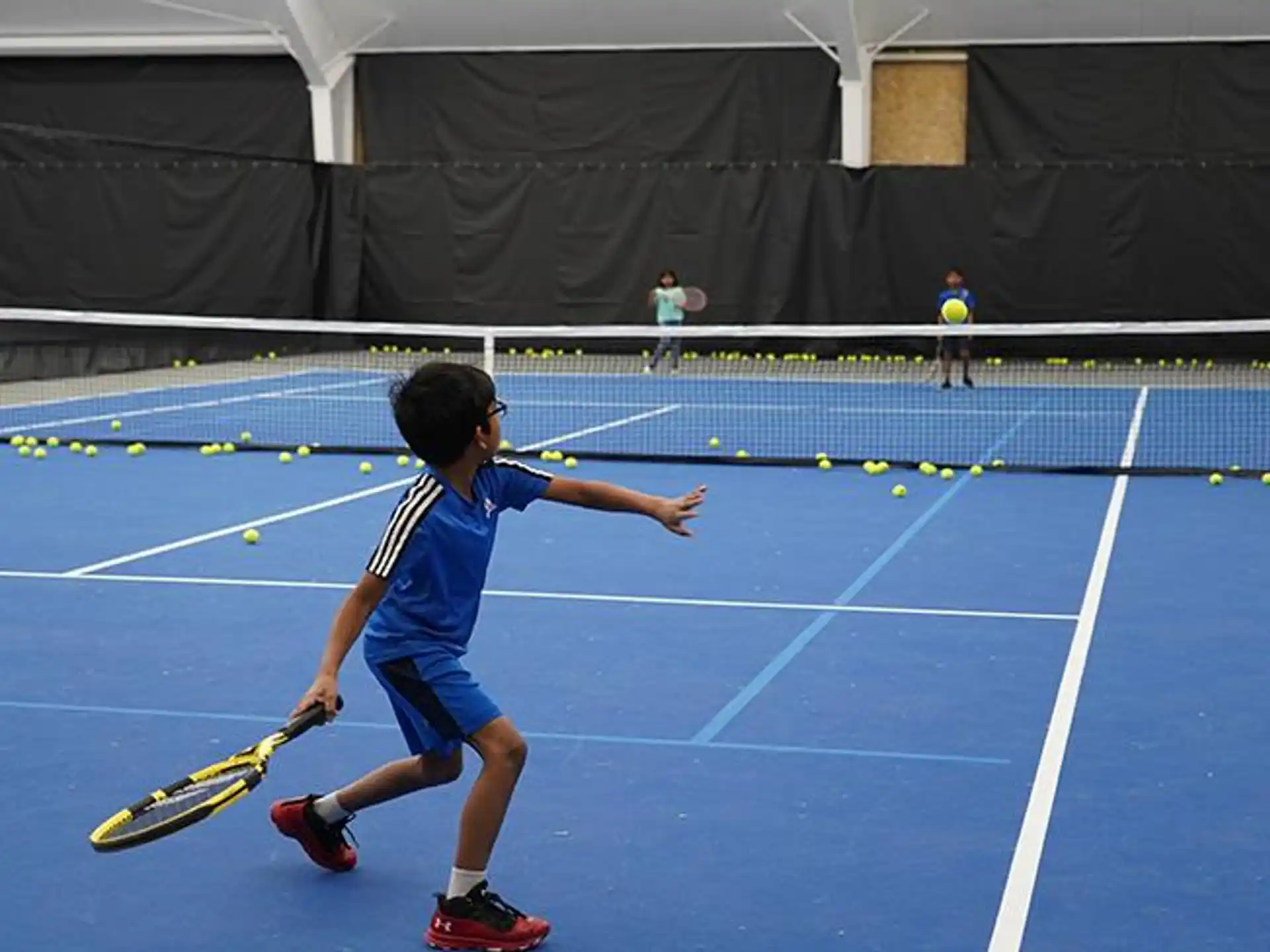 a man playing tennis
