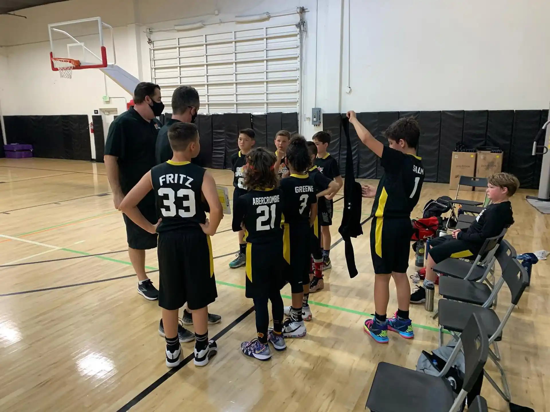 a group of people in a gym