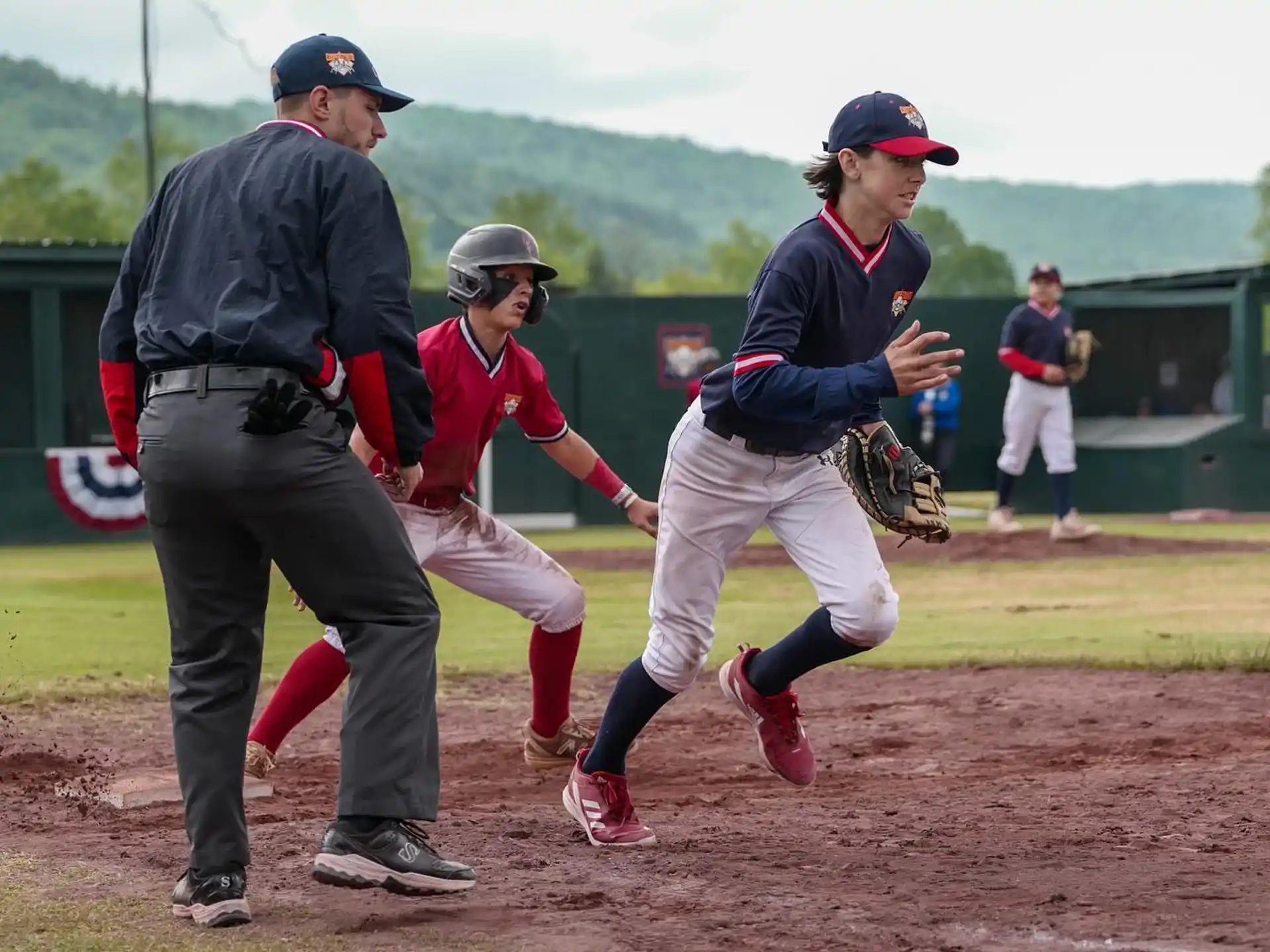 a baseball player running to home plate