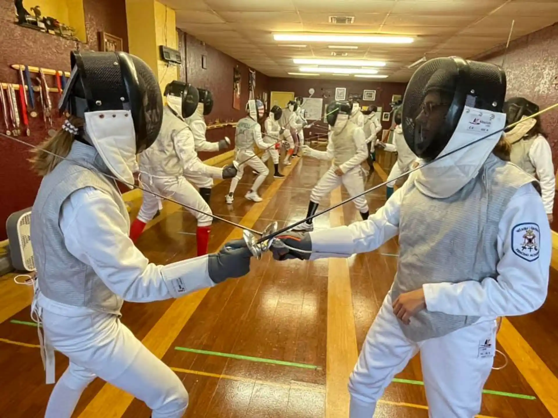 a group of people in white uniforms
