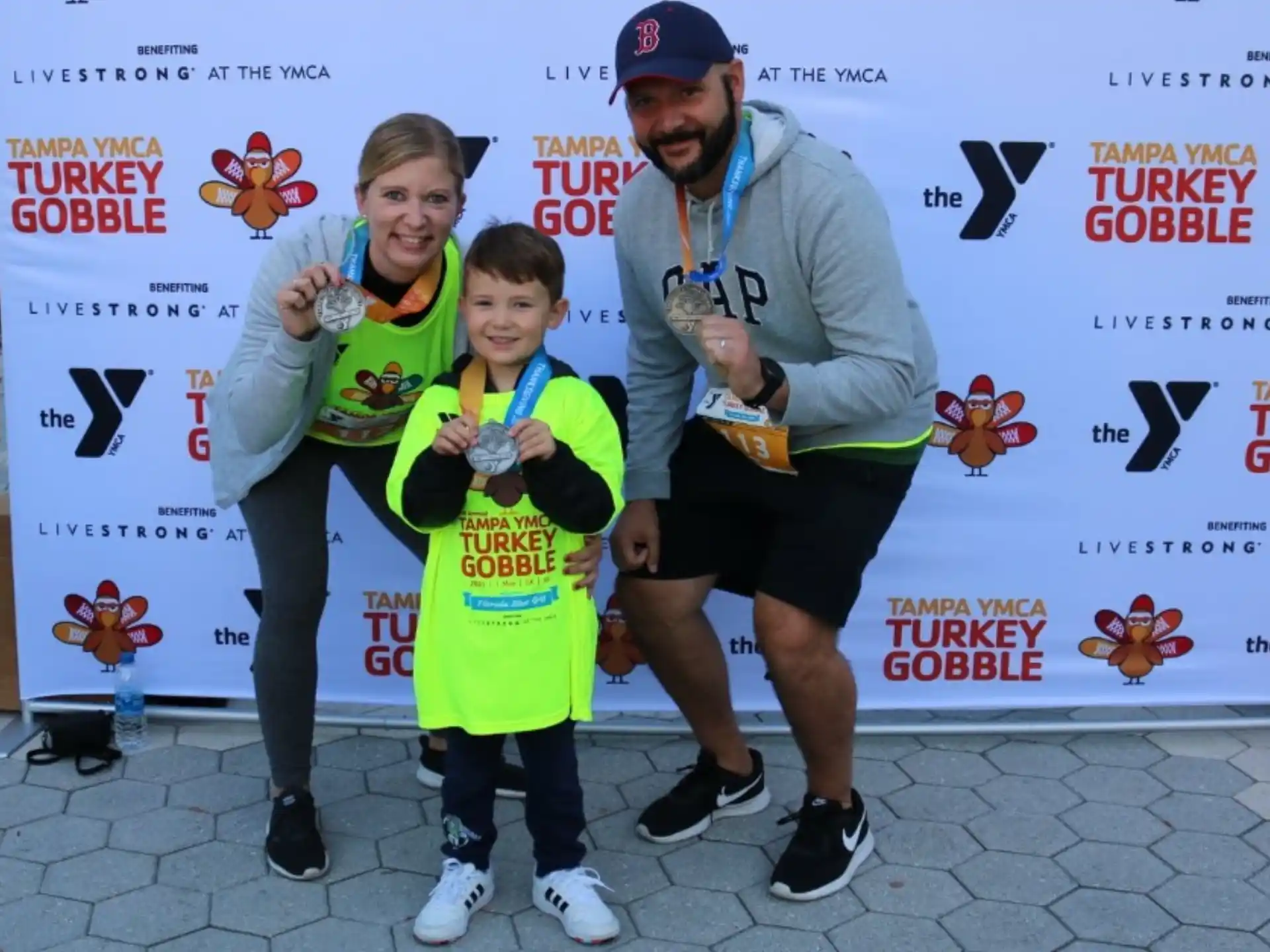 a person and two children posing for a photo