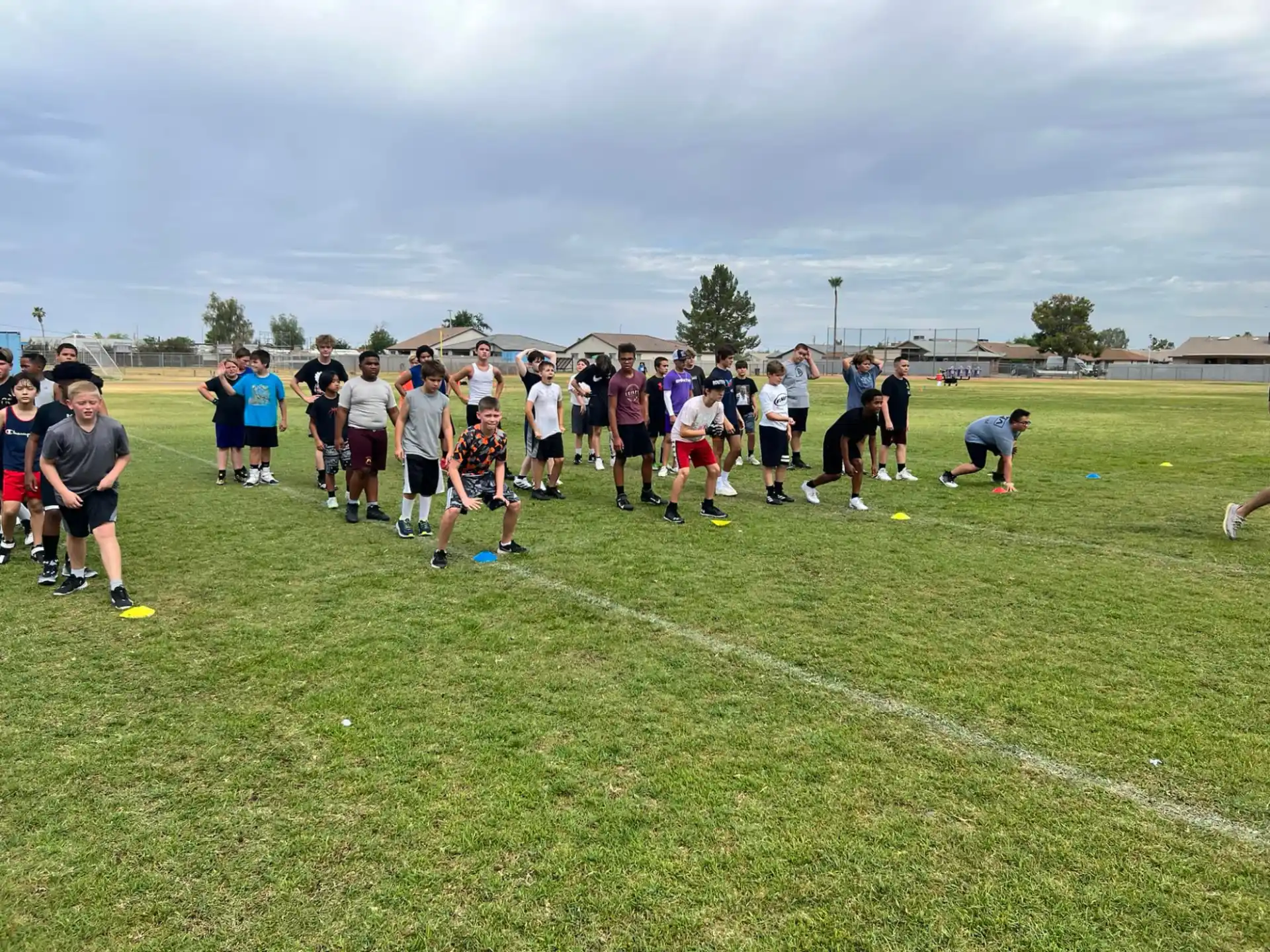 a group of people playing football