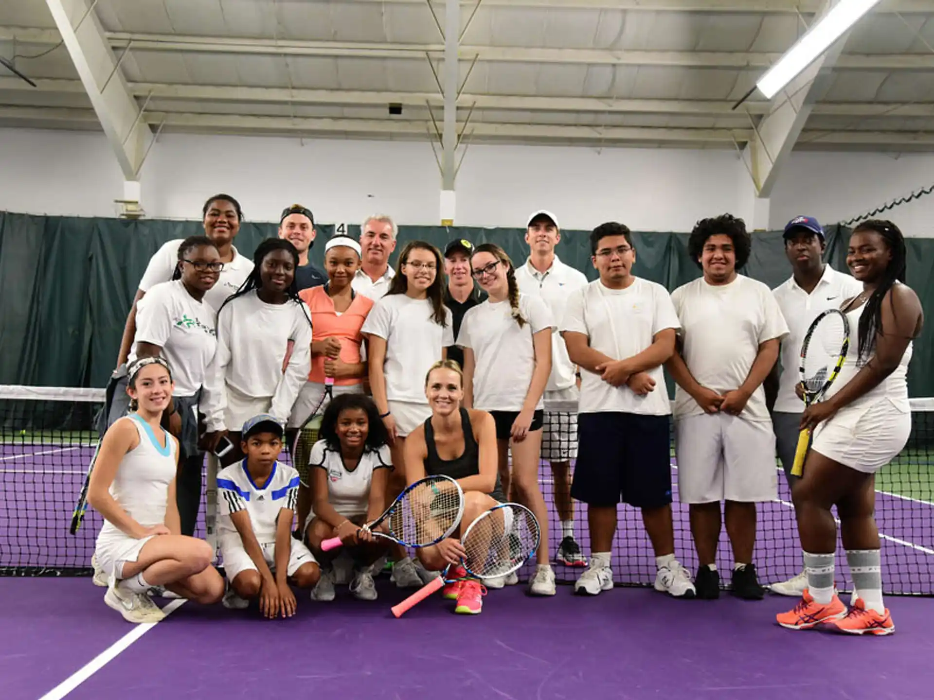 a group of people posing for a photo
