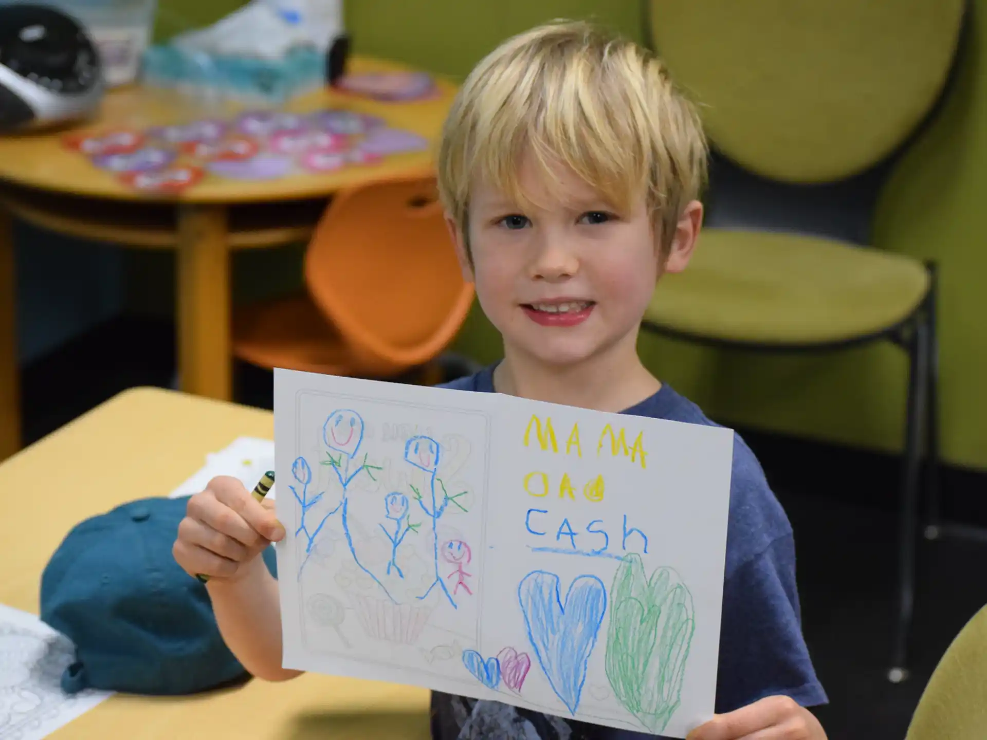 a boy holding a book