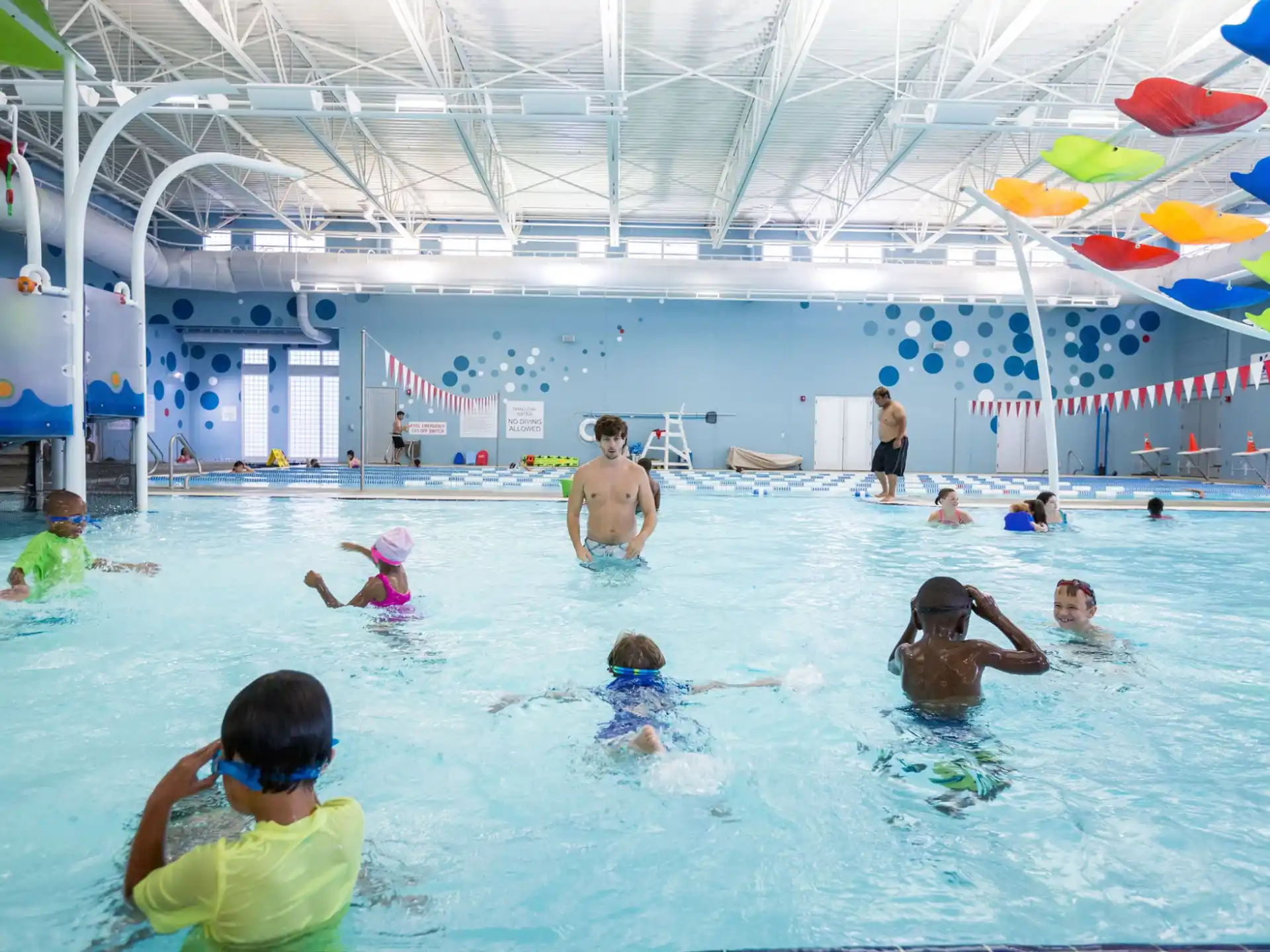 a group of people in a pool