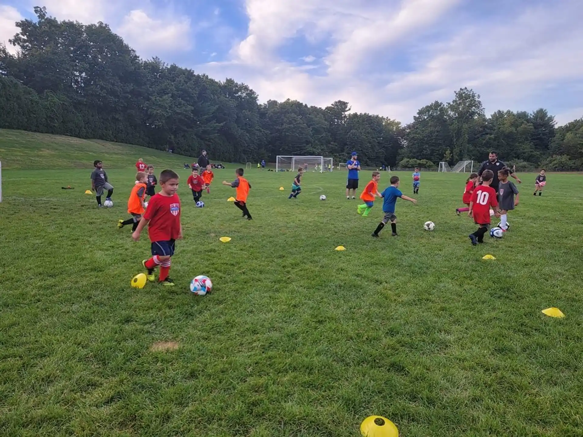 a group of kids playing football