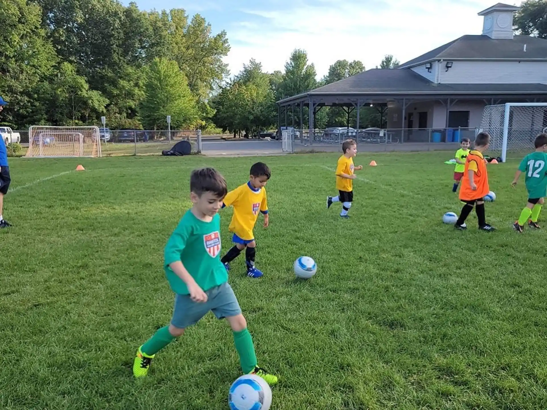 kids playing football on a field