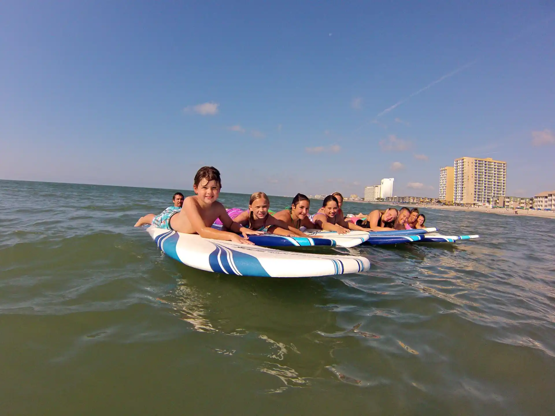 a group of people on a raft in the water