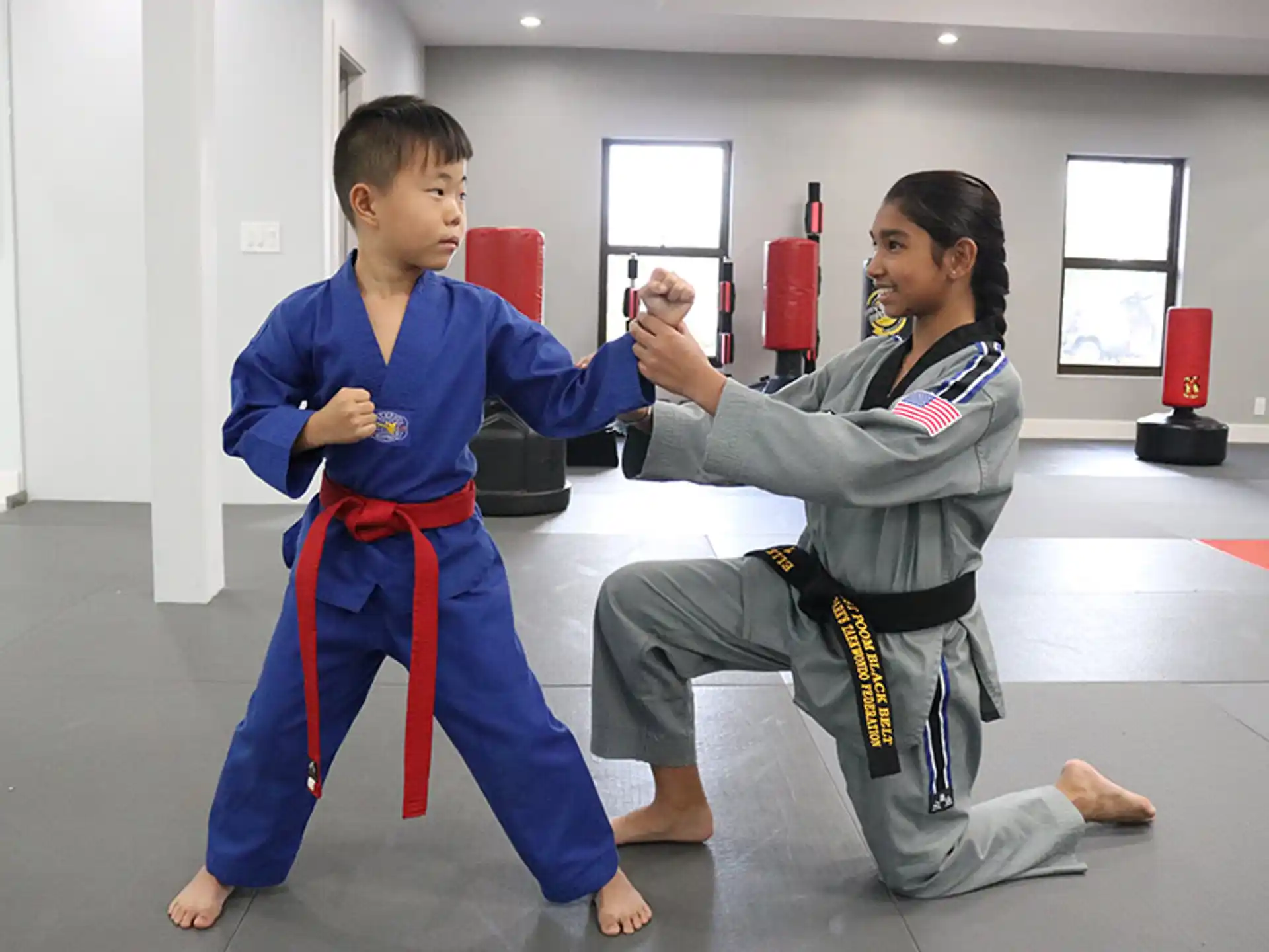 a few people in martial arts uniforms