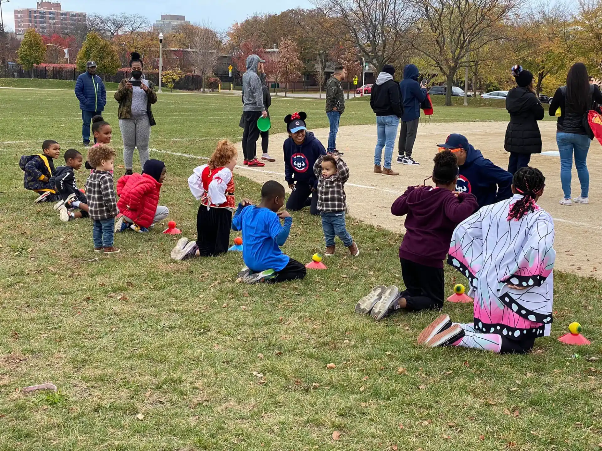 a group of people playing in a park