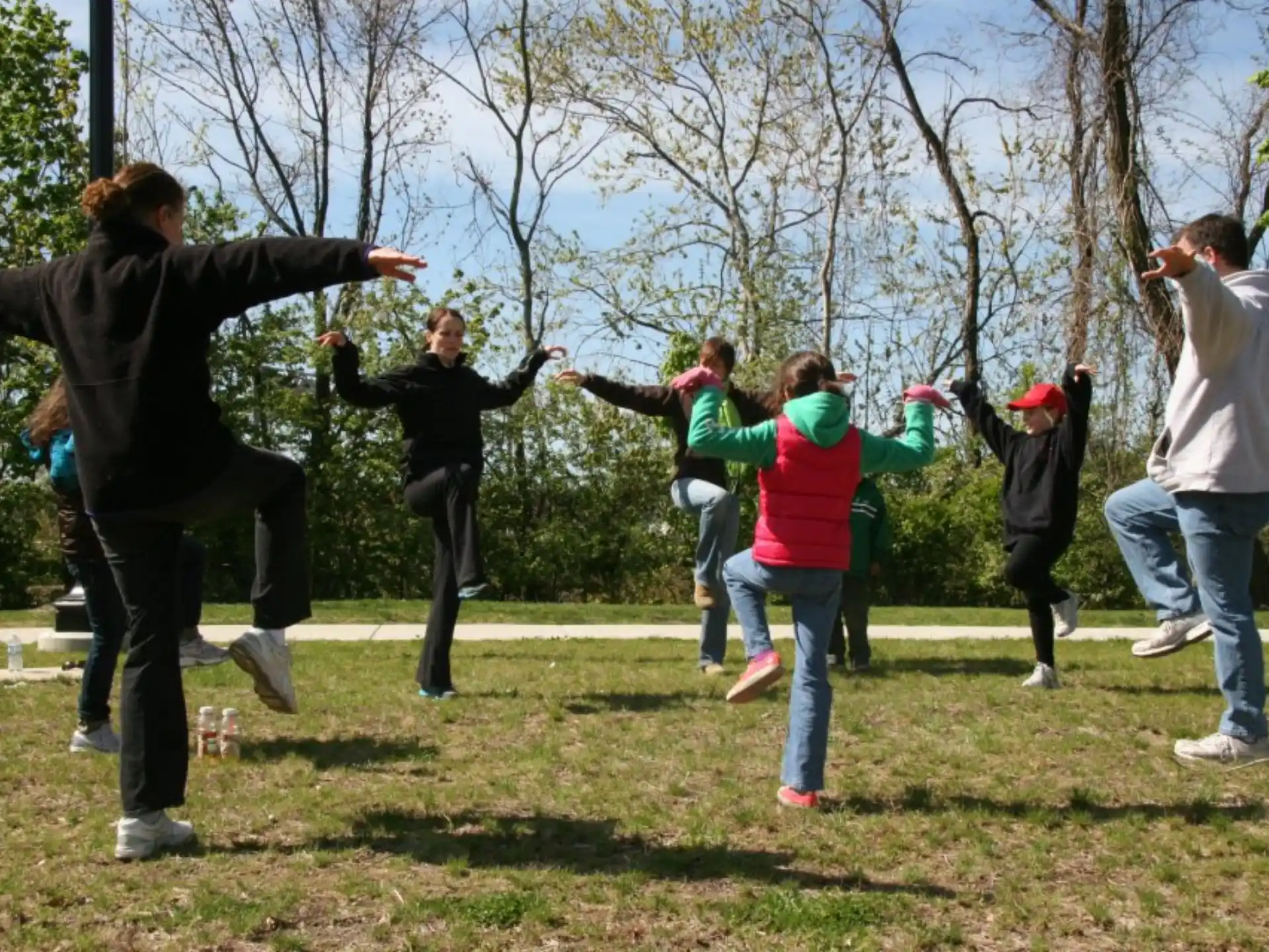 a group of people jumping in the air