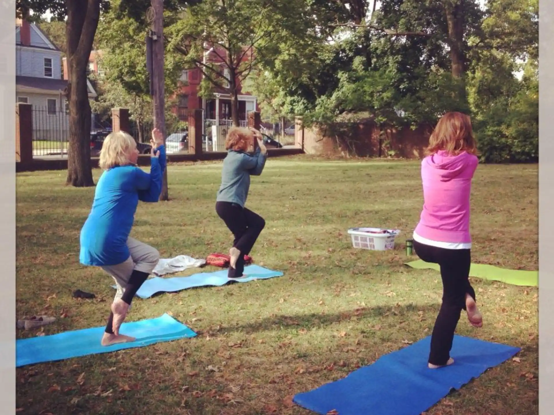 a group of women doing yoga