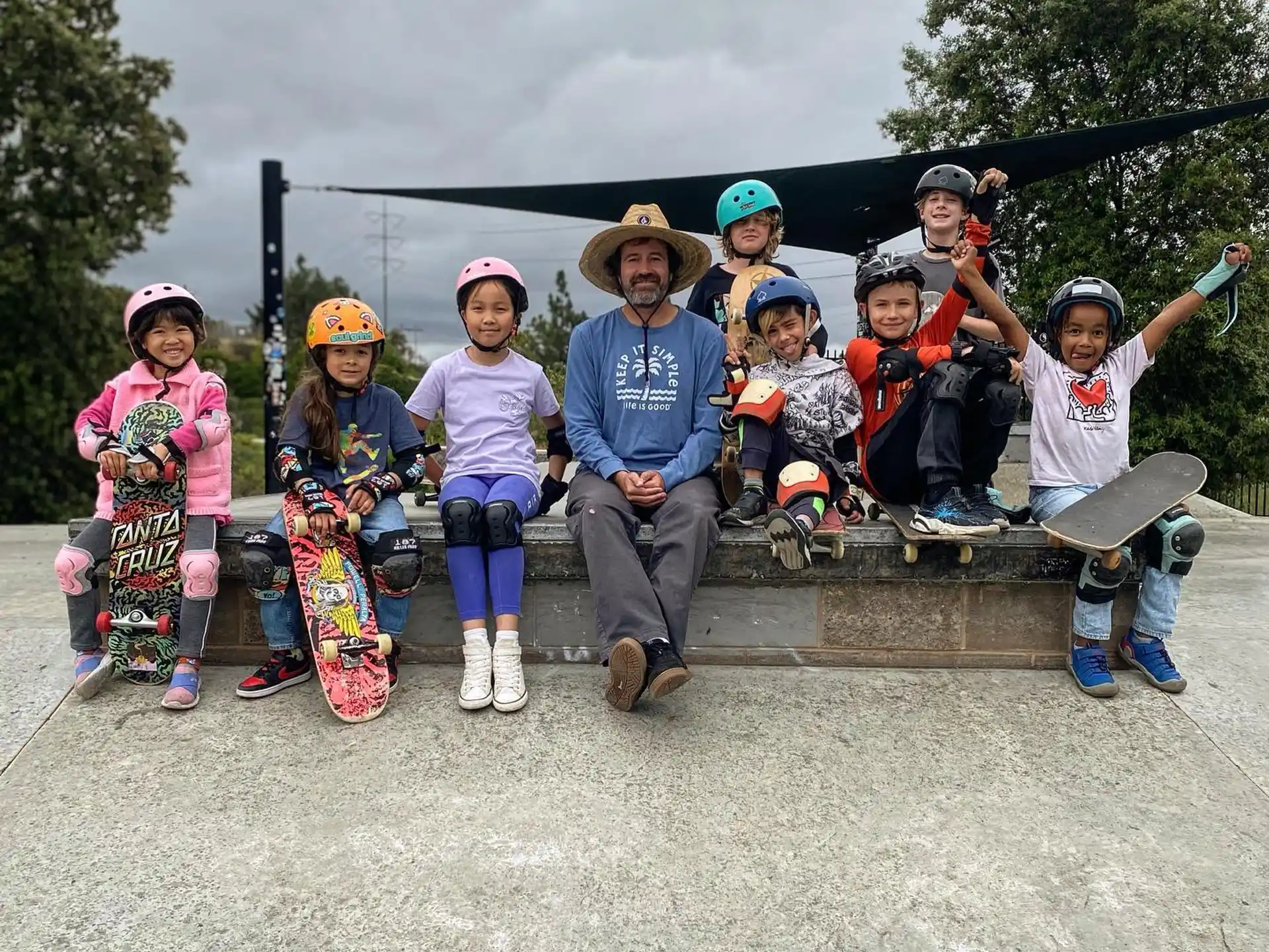 a group of kids posing for a photo