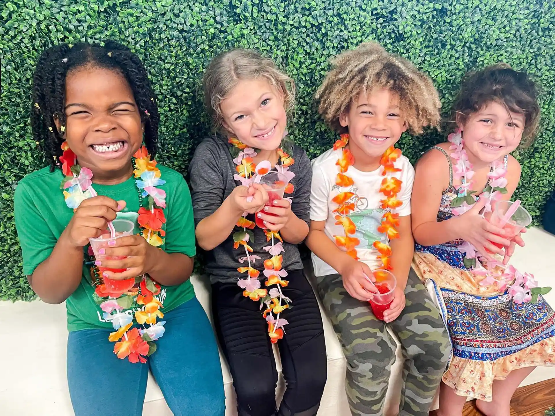 a group of children posing for a photo