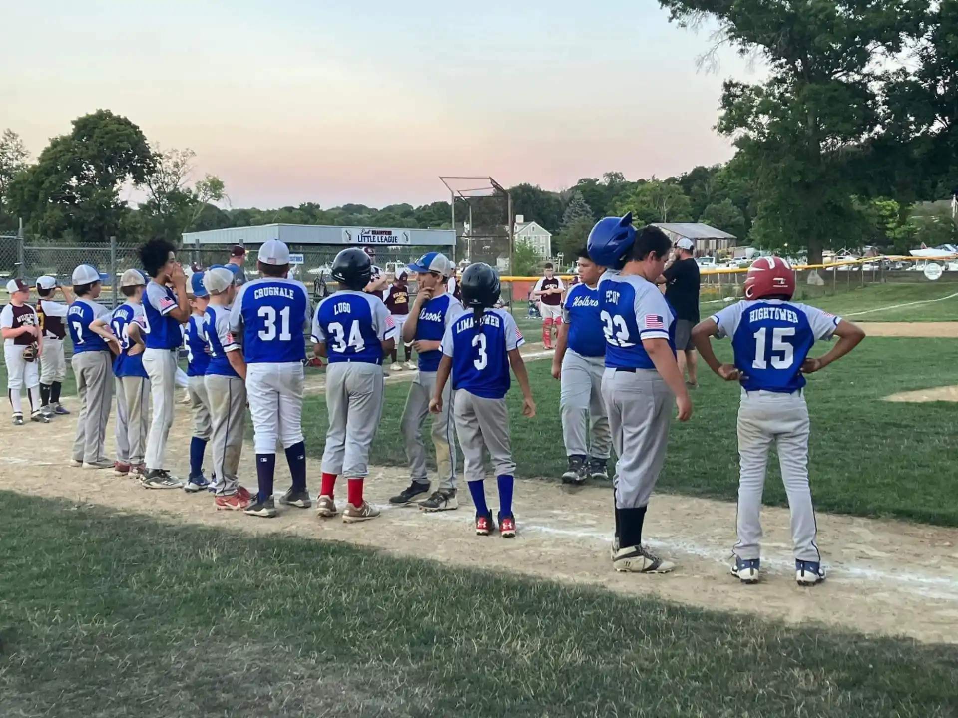 a group of people in sports uniforms