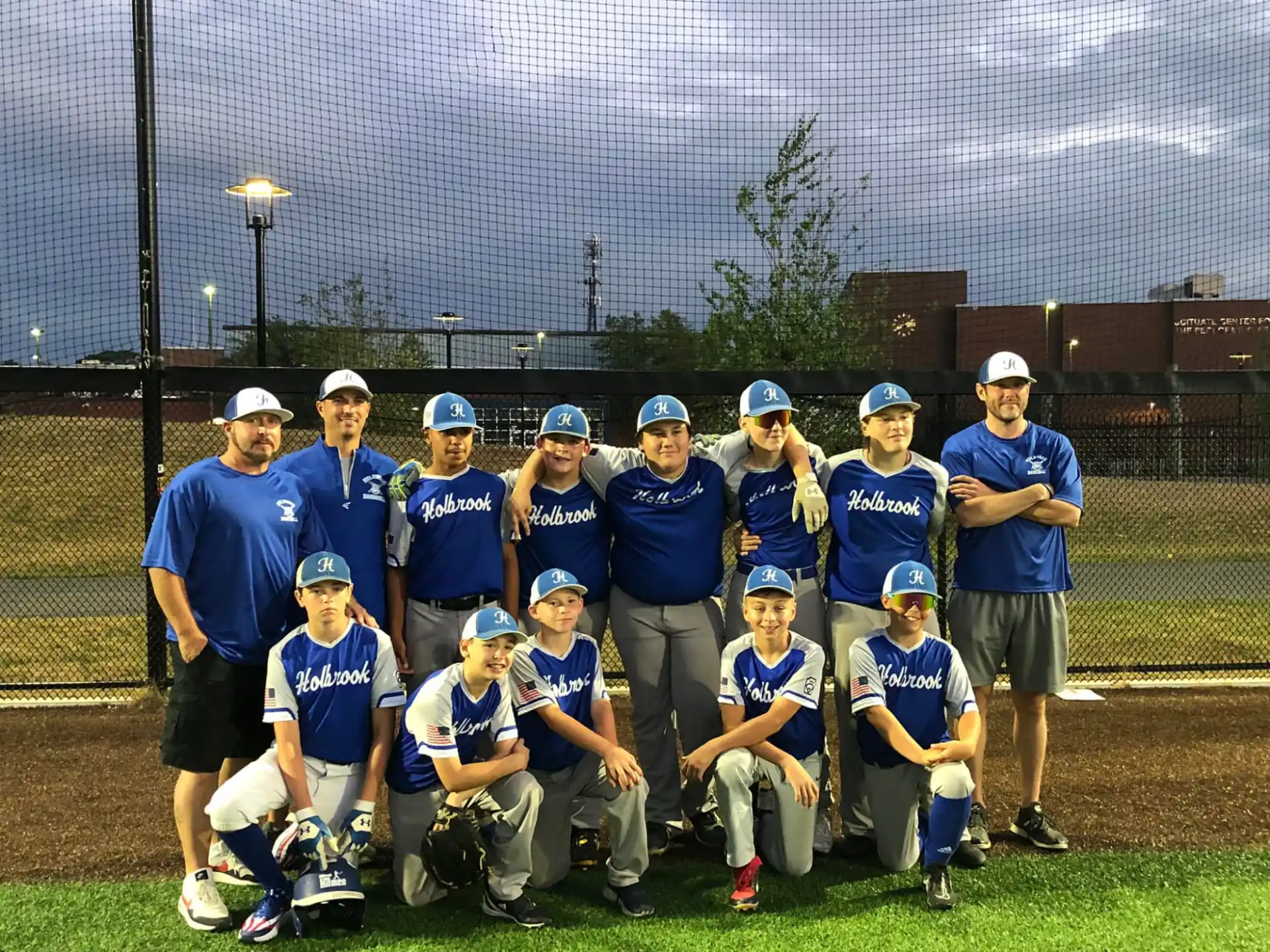 a group of people wearing blue uniforms