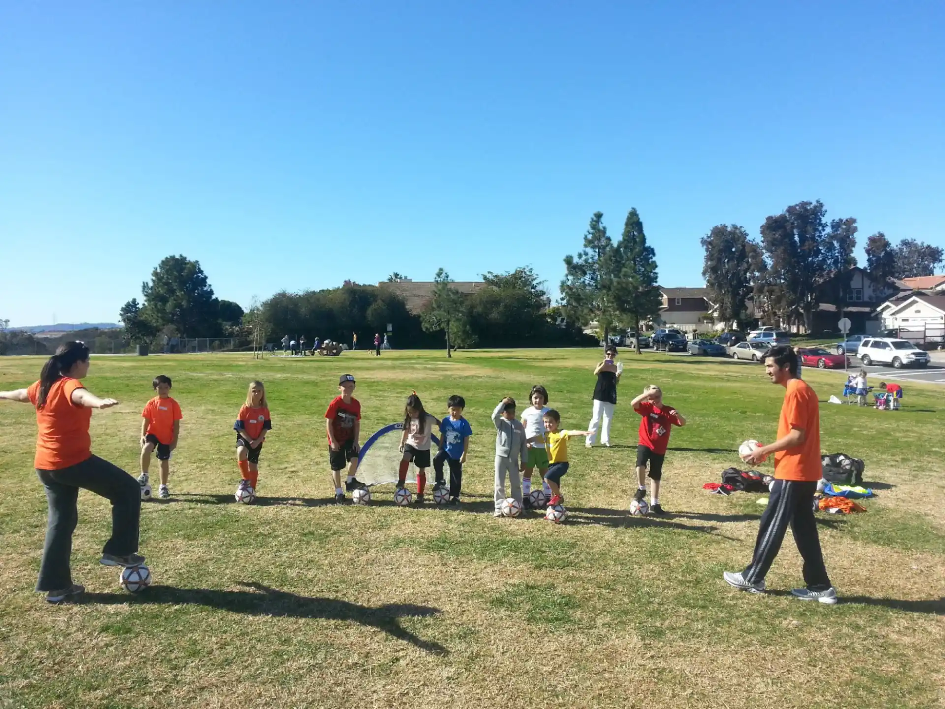 a group of kids playing football