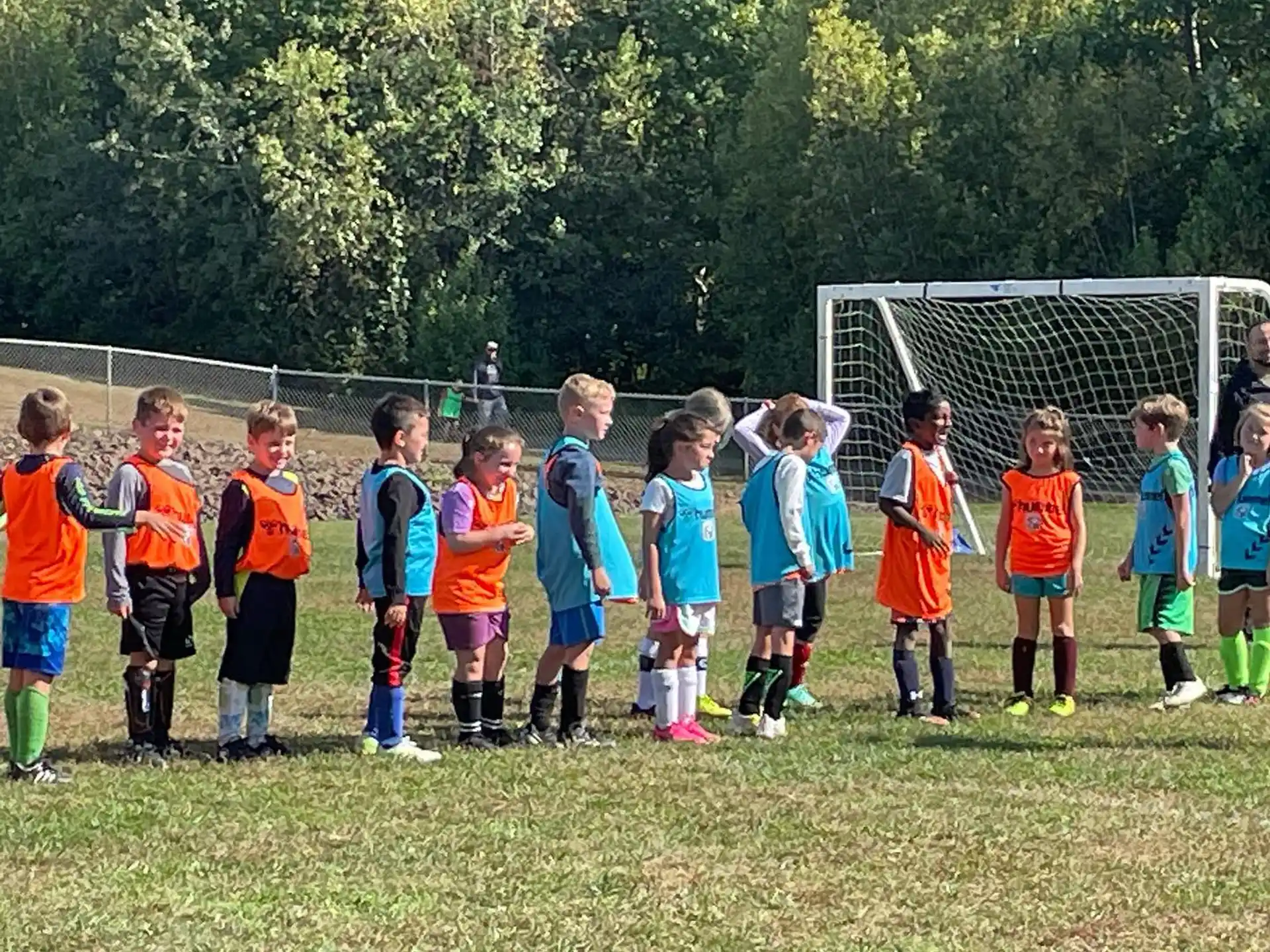 a group of kids in uniform