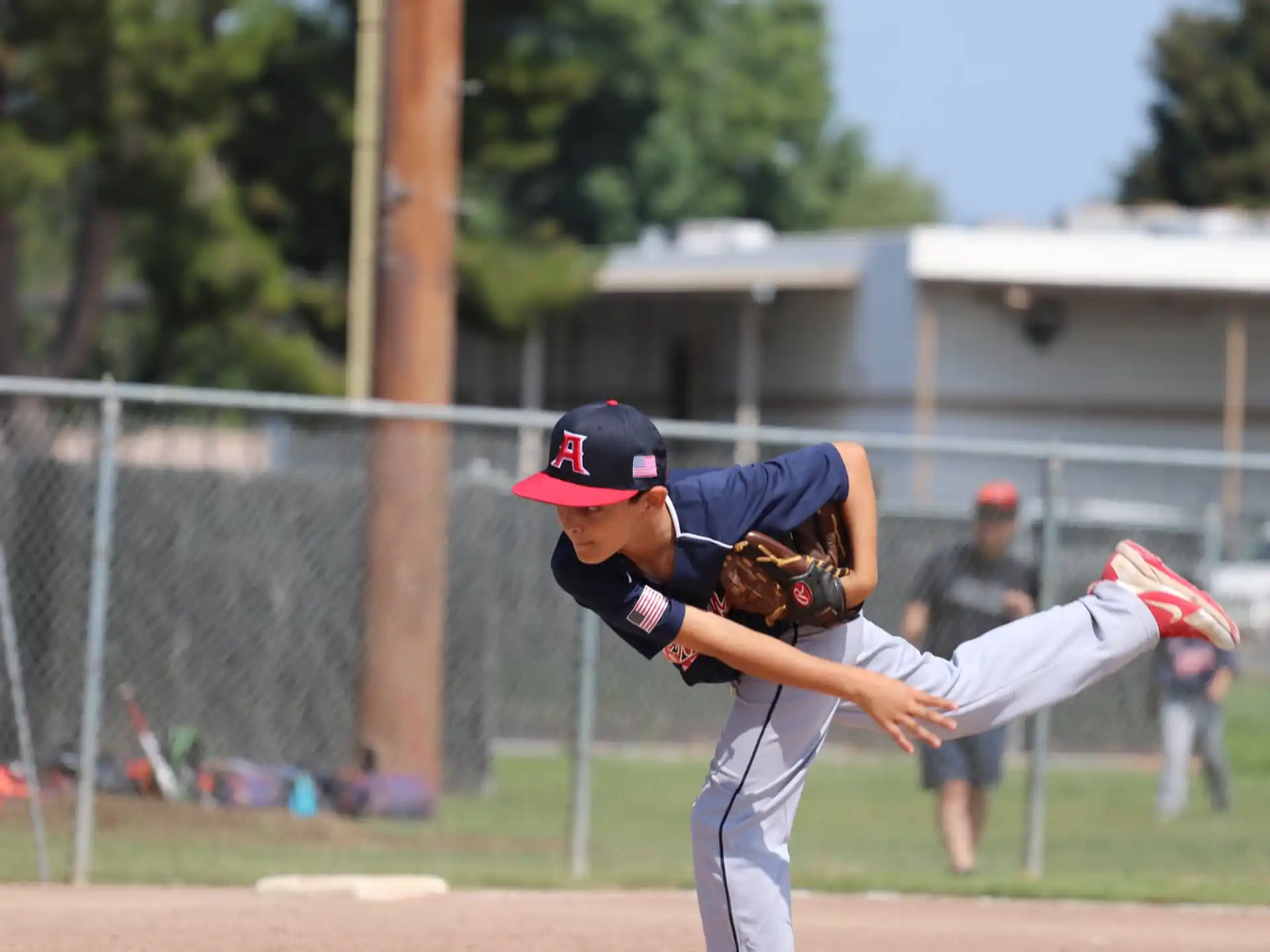 a baseball player throwing a ball