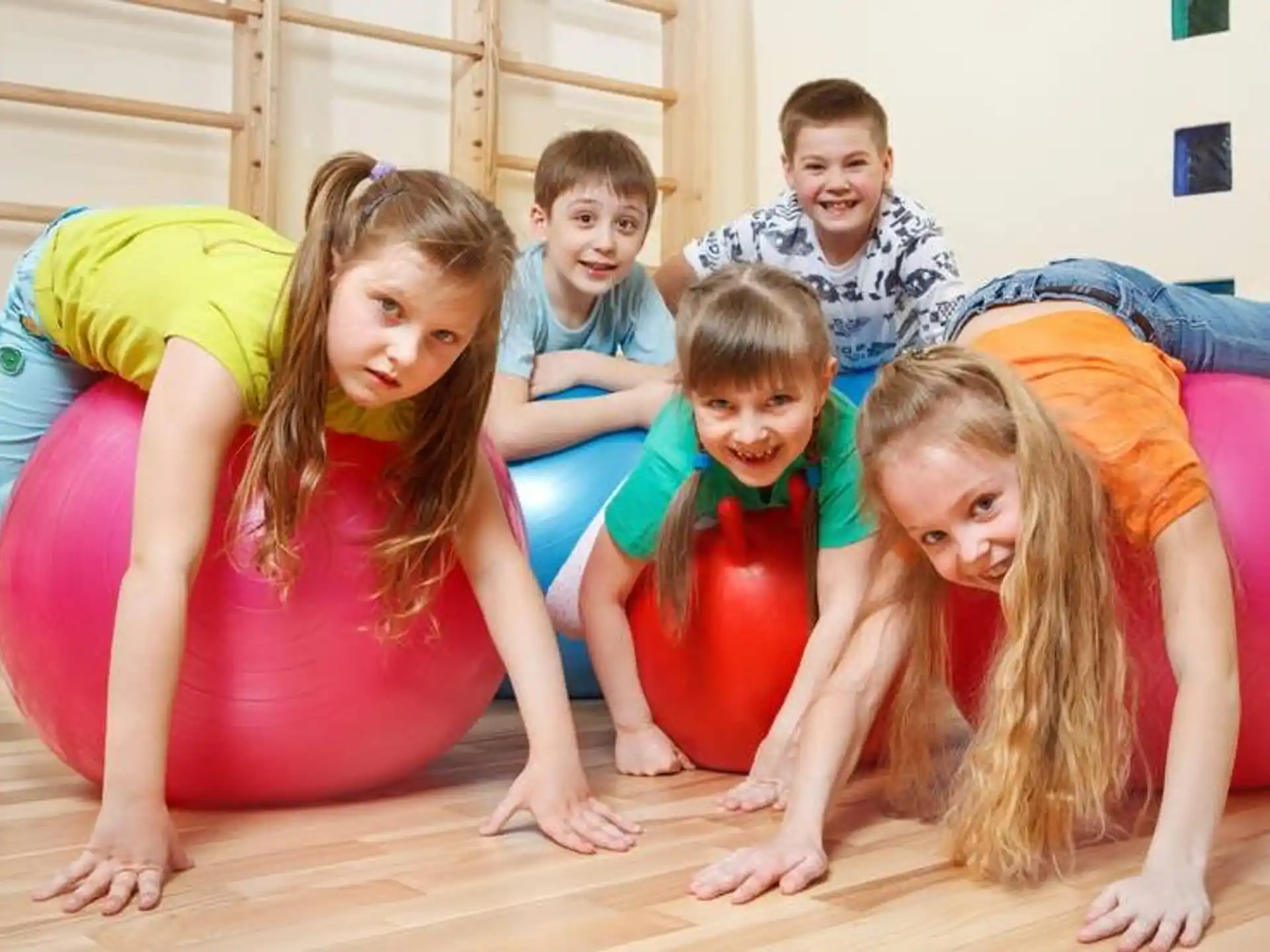 a group of children posing for a photo
