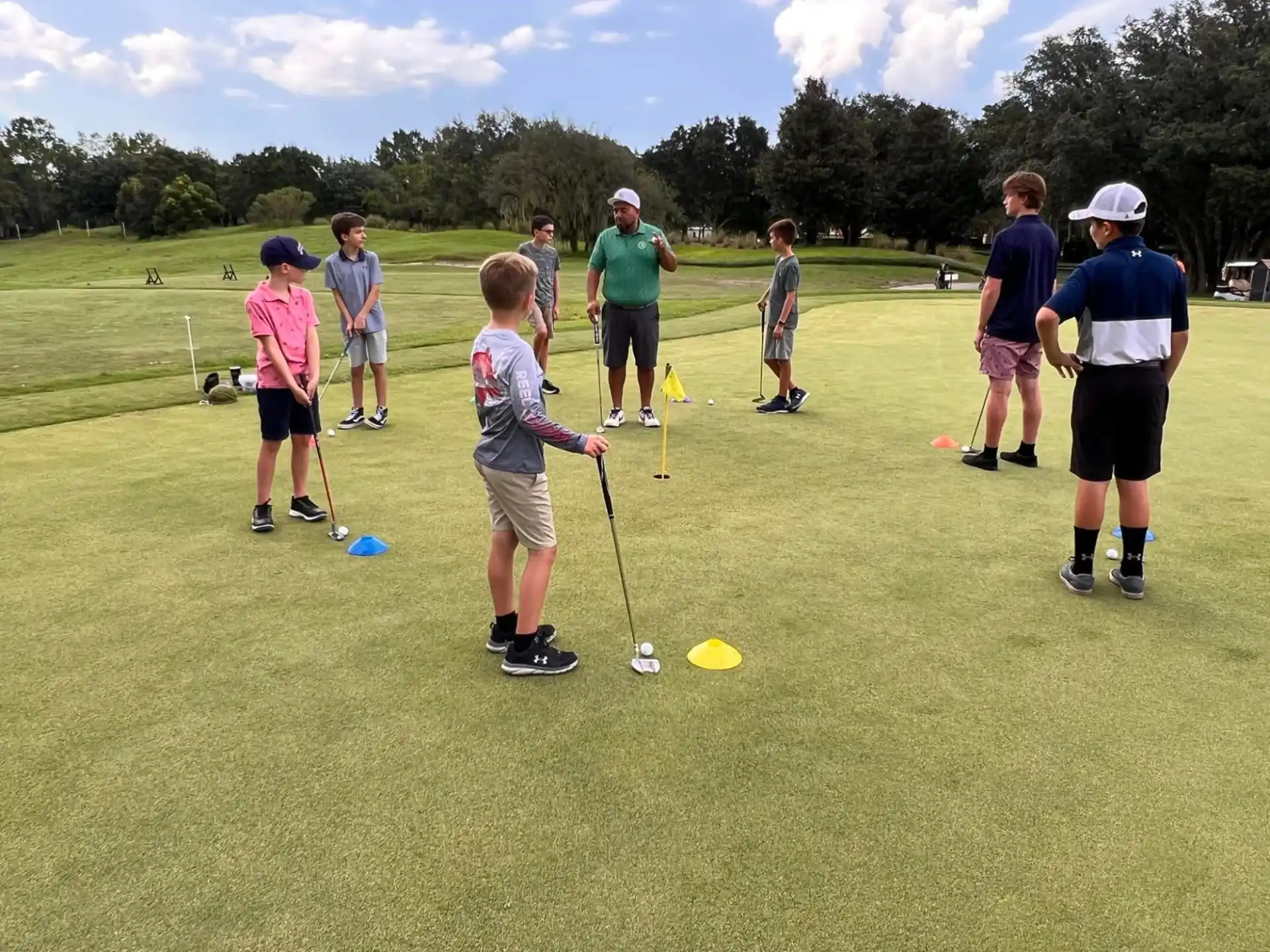 a group of people playing golf