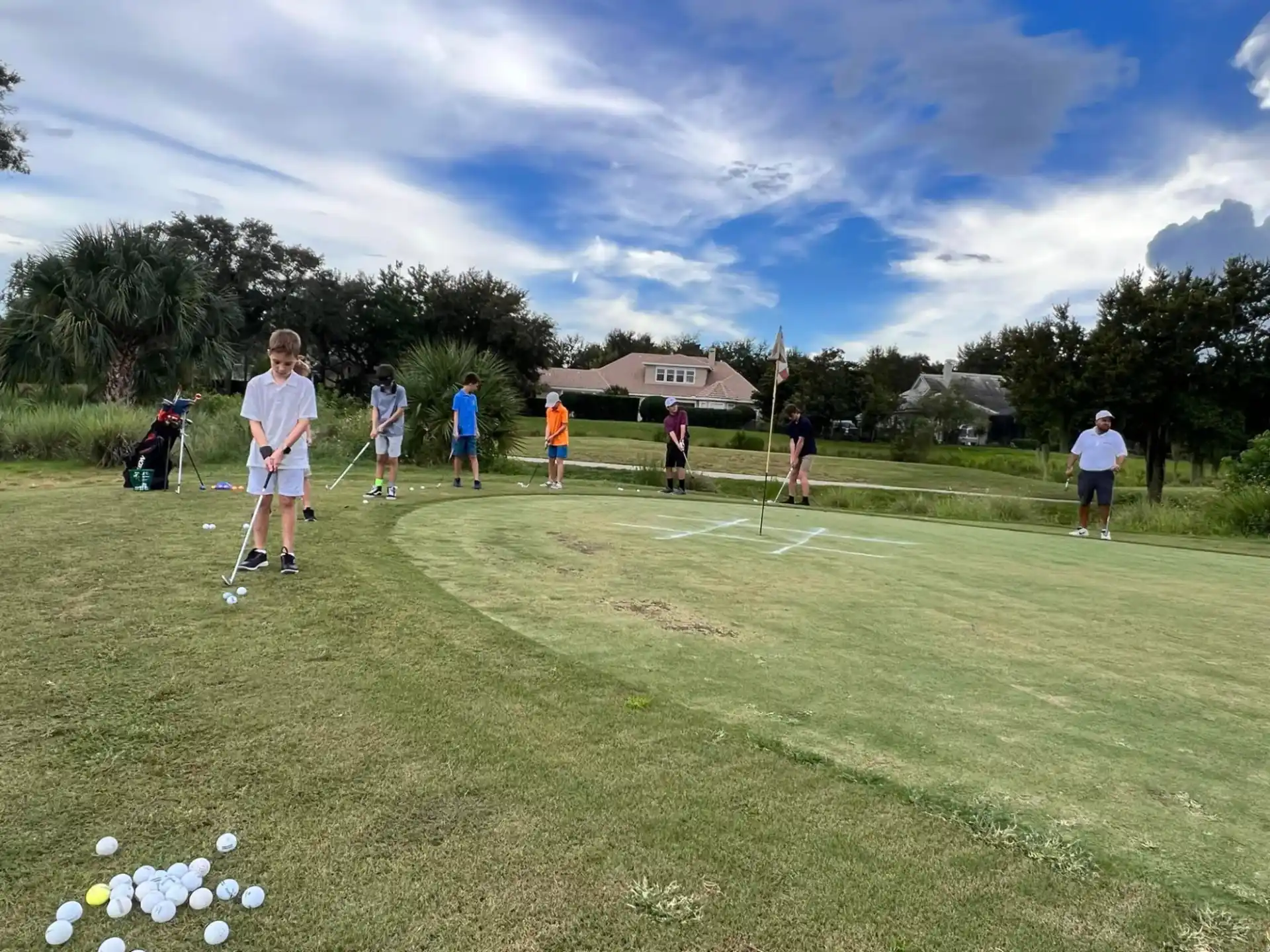 a group of people playing golf