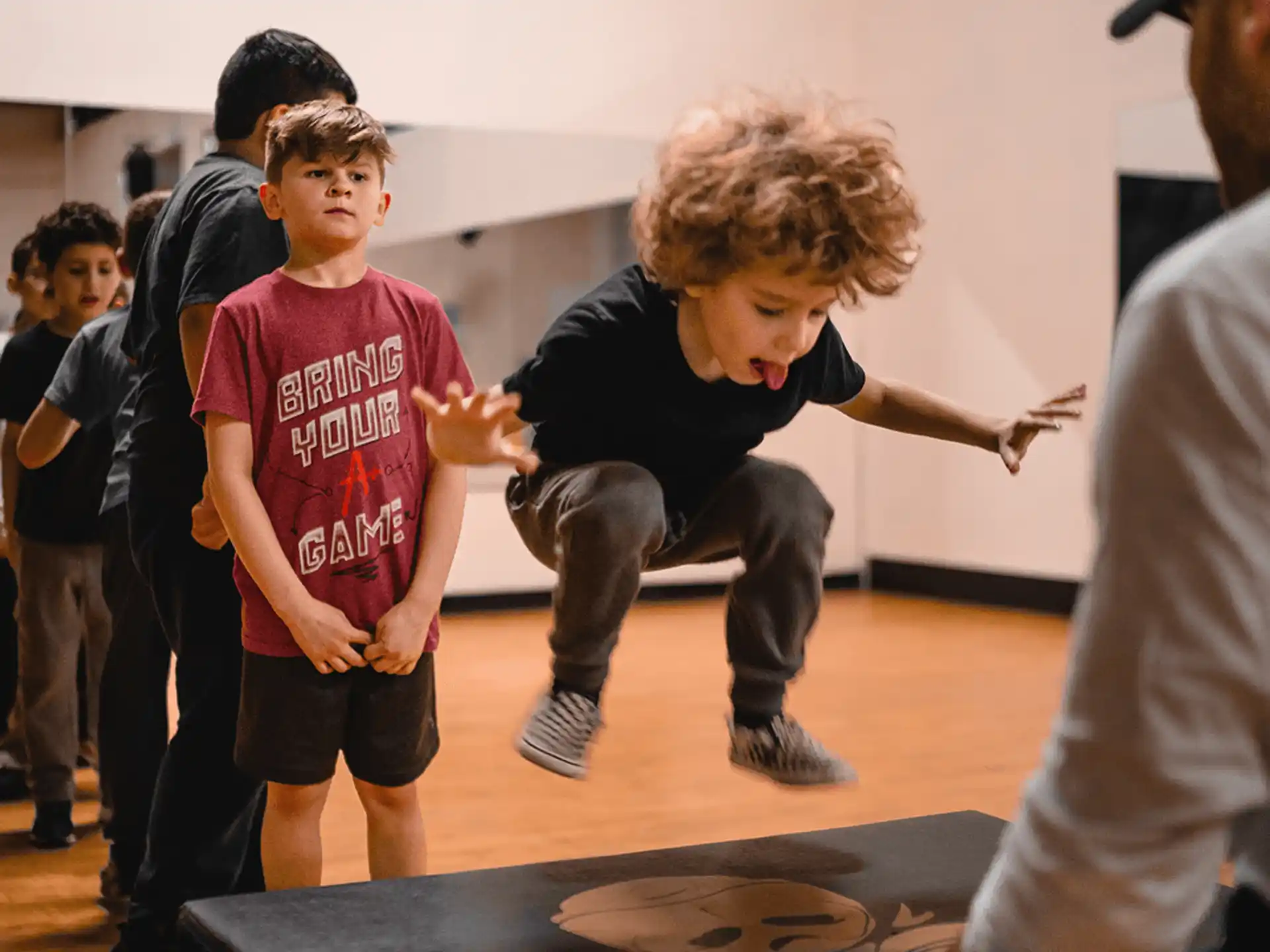 a group of children playing with a toy