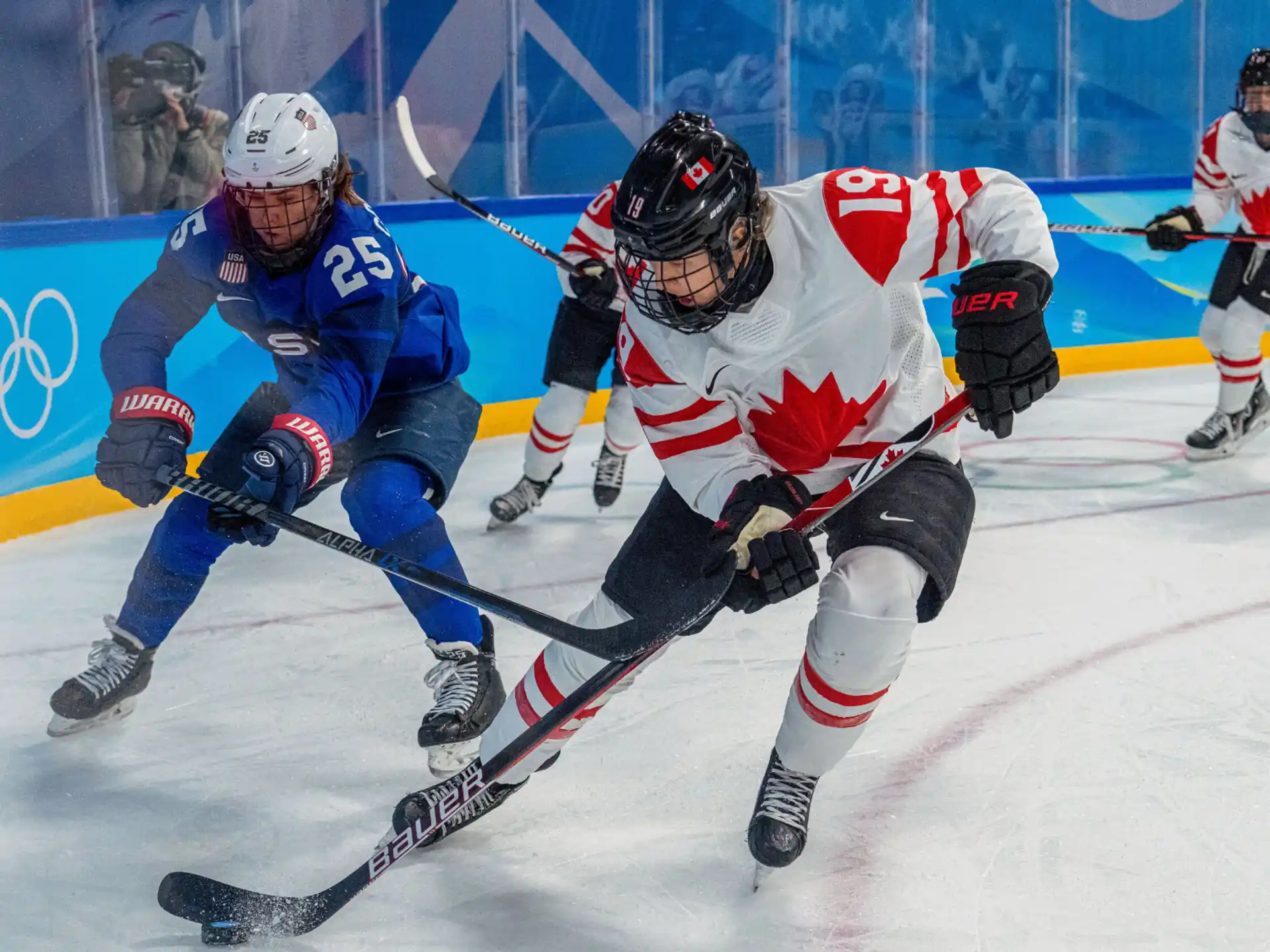 a group of men playing hockey