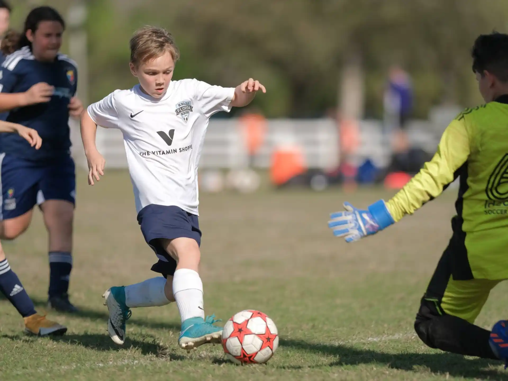 a group of kids playing football