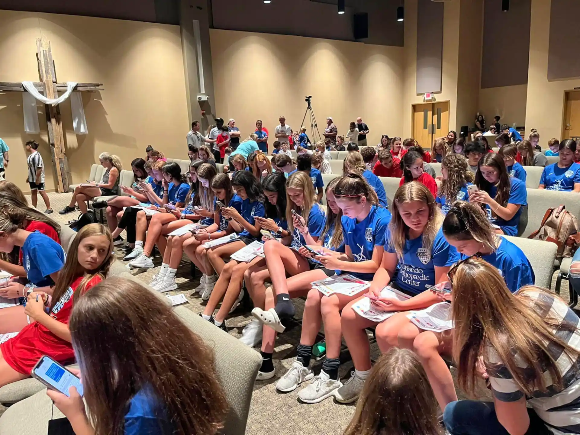 a group of people sitting in a room