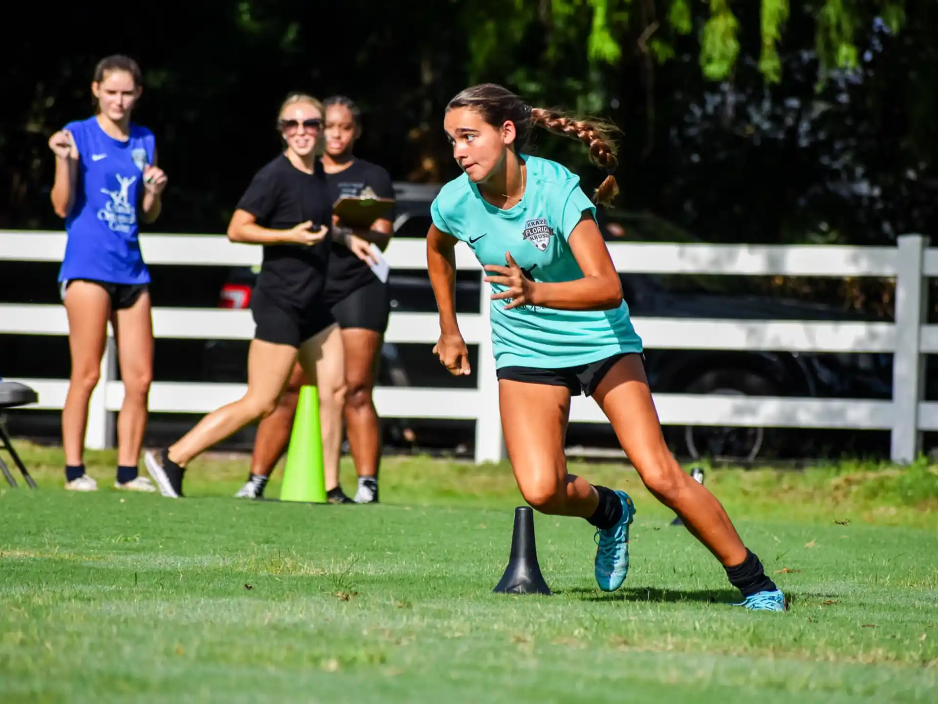 a woman running on a field